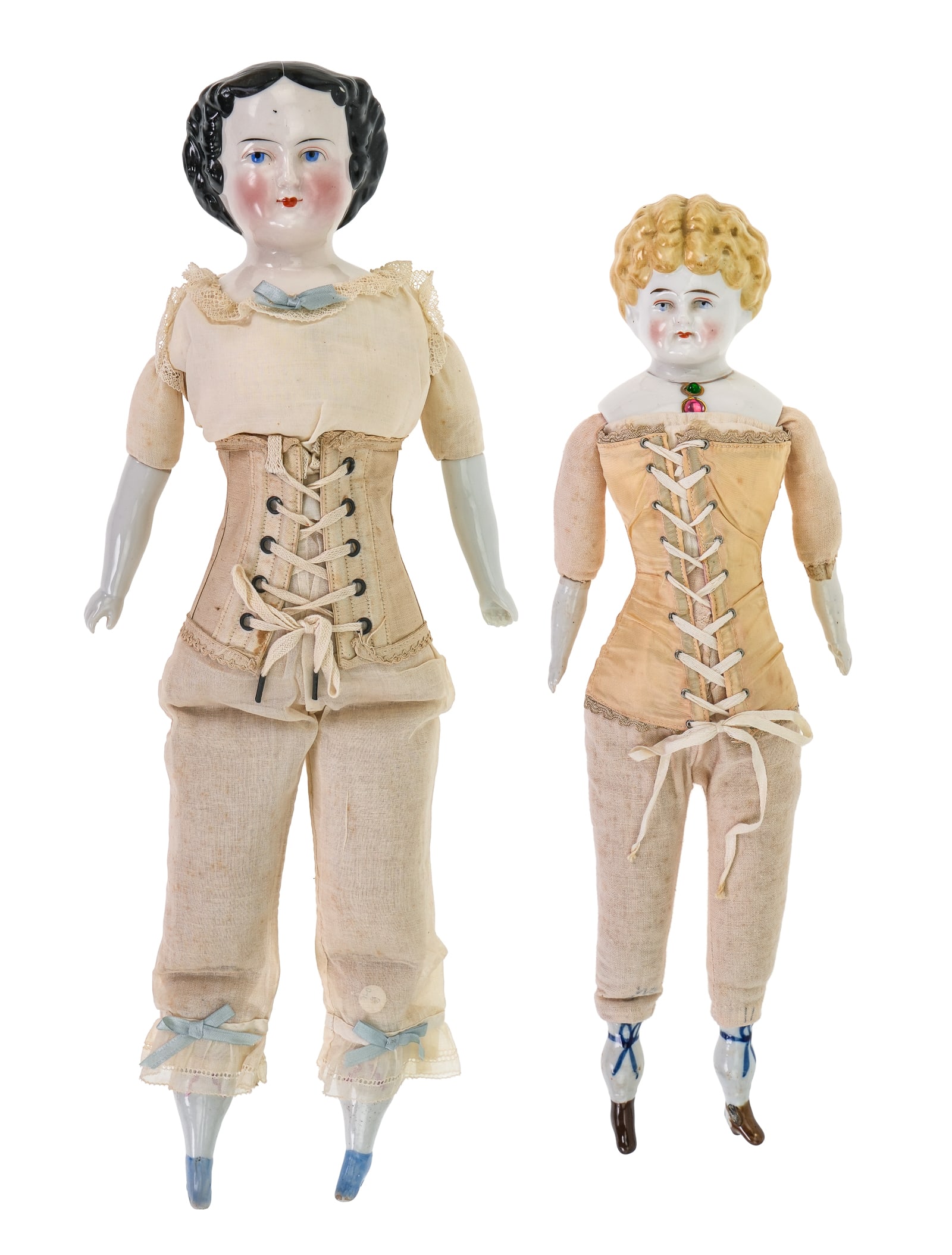 Mid 19th c China Head Dolls: Two mid 19th china head dolls, both with china hands & feet, both completely professionally restored with new cloth bodies and clothing, hts 17", 19"