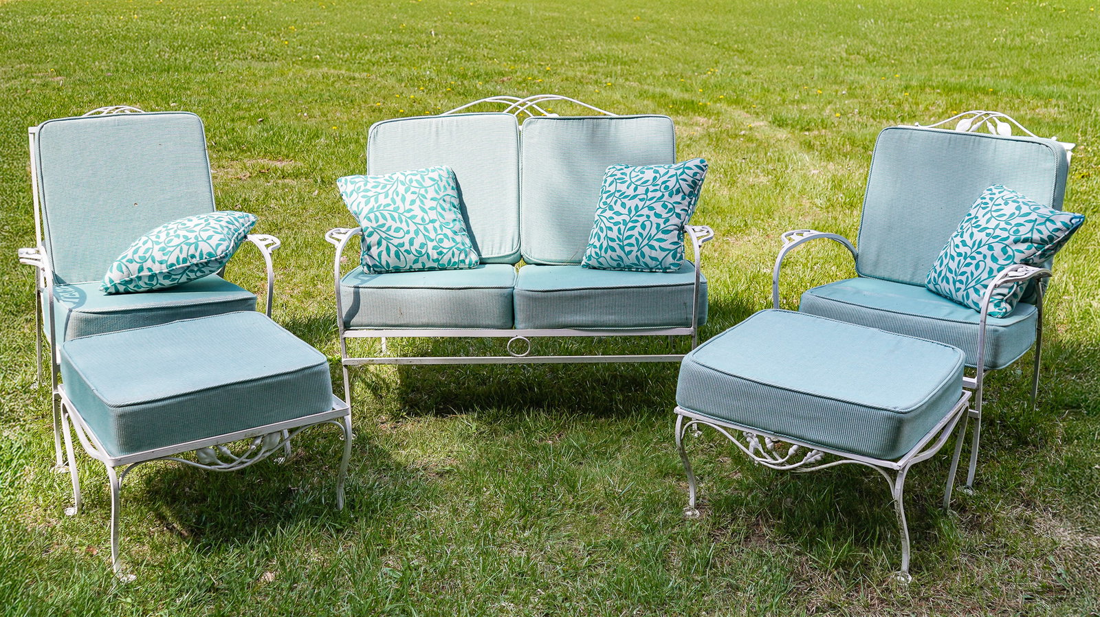 Iron Patio Settee, Armchairs, Stools: 5 pc set of iron patio furniture, including settee, pair of armchairs, and pair of ottomans/ footstools, with cushions, settee length 46"