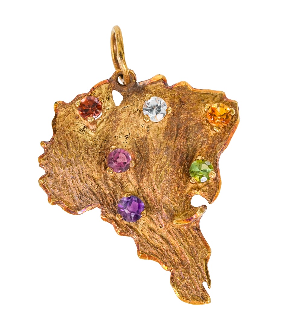 18k Brazil Pendant: 18k yellow gold pendant in the shape of brazil with 6 round cut semi-precious stones. 1" long, 3 grams t.w.
