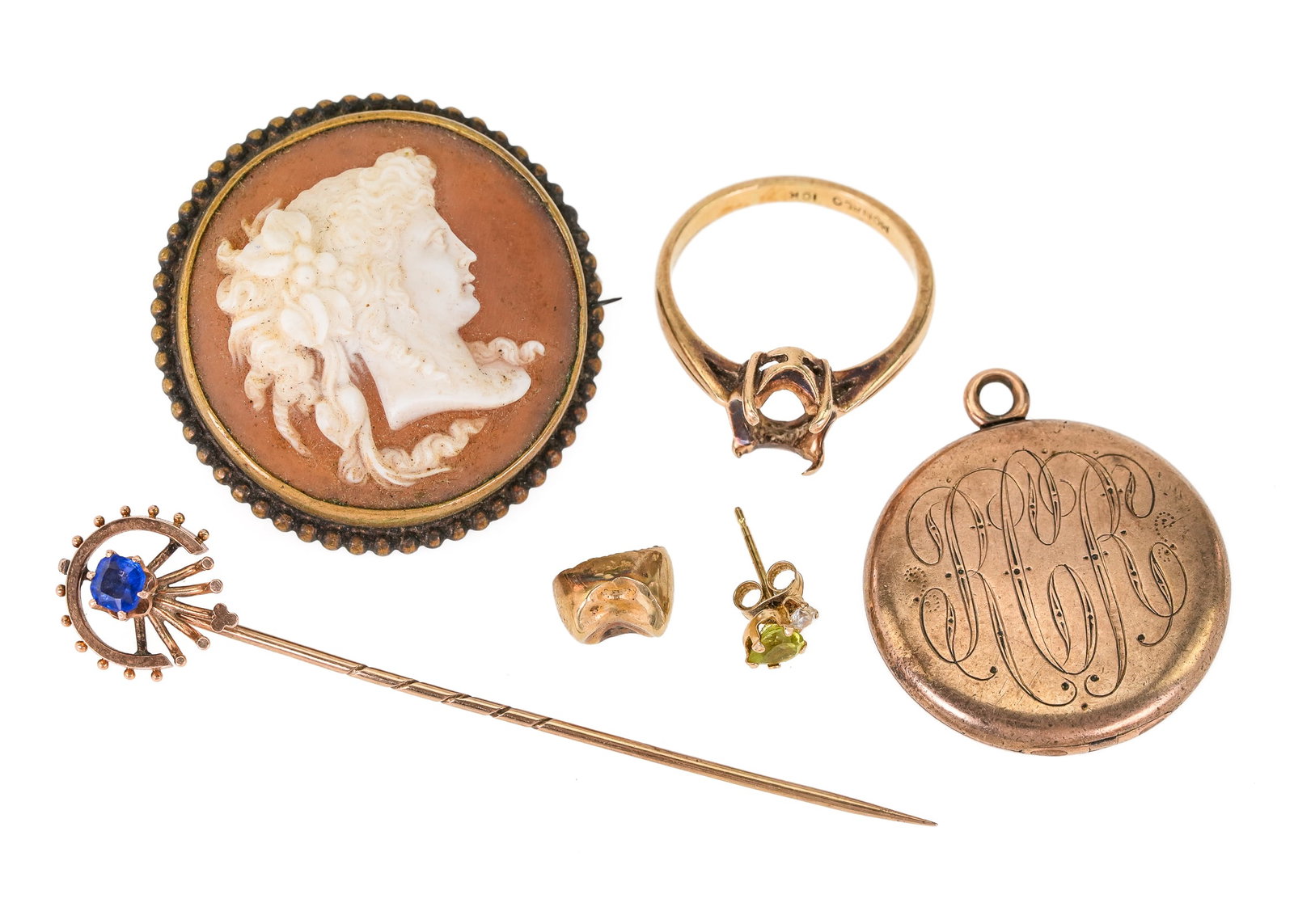 Victorian Jewelry: A group of Victorian jewelry including a cameo in rolled gold frame, engraved rolled gold locket, rolled gold stick pin with blue stone, a 10k yellow gold ring missing stone, and a gold tooth.