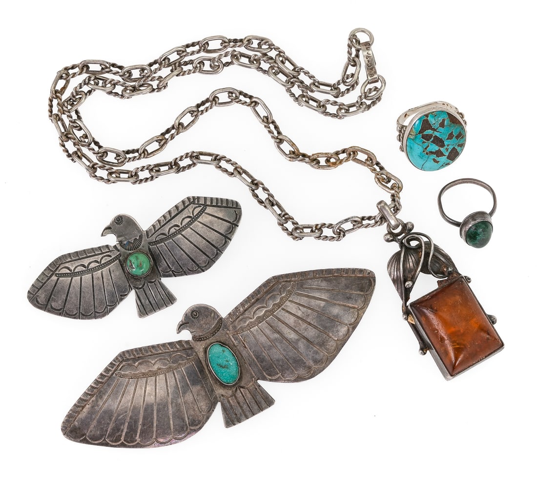 Mexican & Navajo Silver Jewelry: A group of Mexico & Navajo silver jewelry including bird brooch pins with Turquoise. Pawn era Navajo ring with large oval Turquoise (bent shank). Heavy Mexico chain with a 2" long rectangular floral