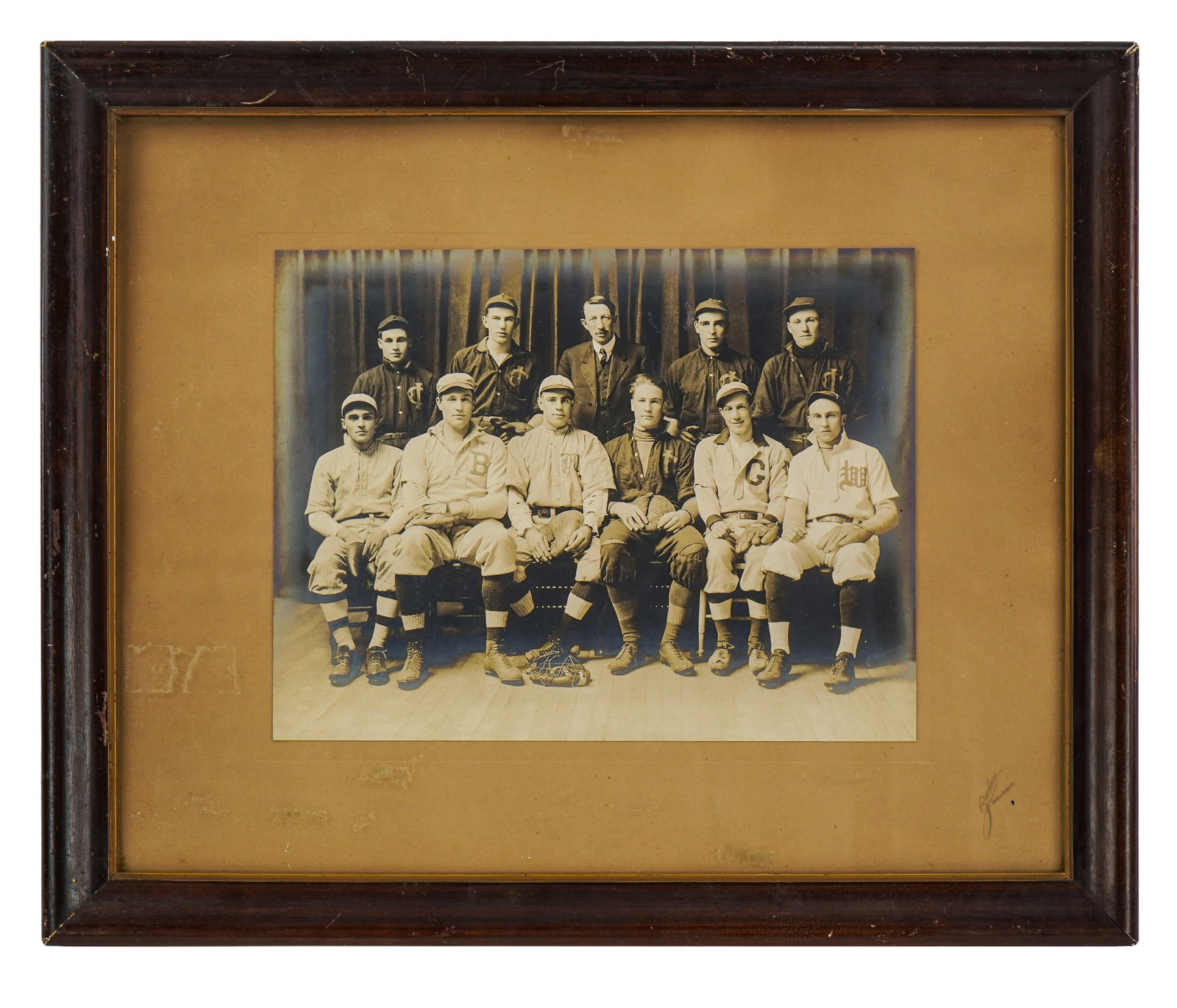 1914 Grand Isle VT Baseball Photograph: 1914 Grand Isle, Vermont baseball team silver gelatin photograph, with note on back "presented by the Grand Isle Baseball Association to Ira Poquette for his efficient services as right fielder for