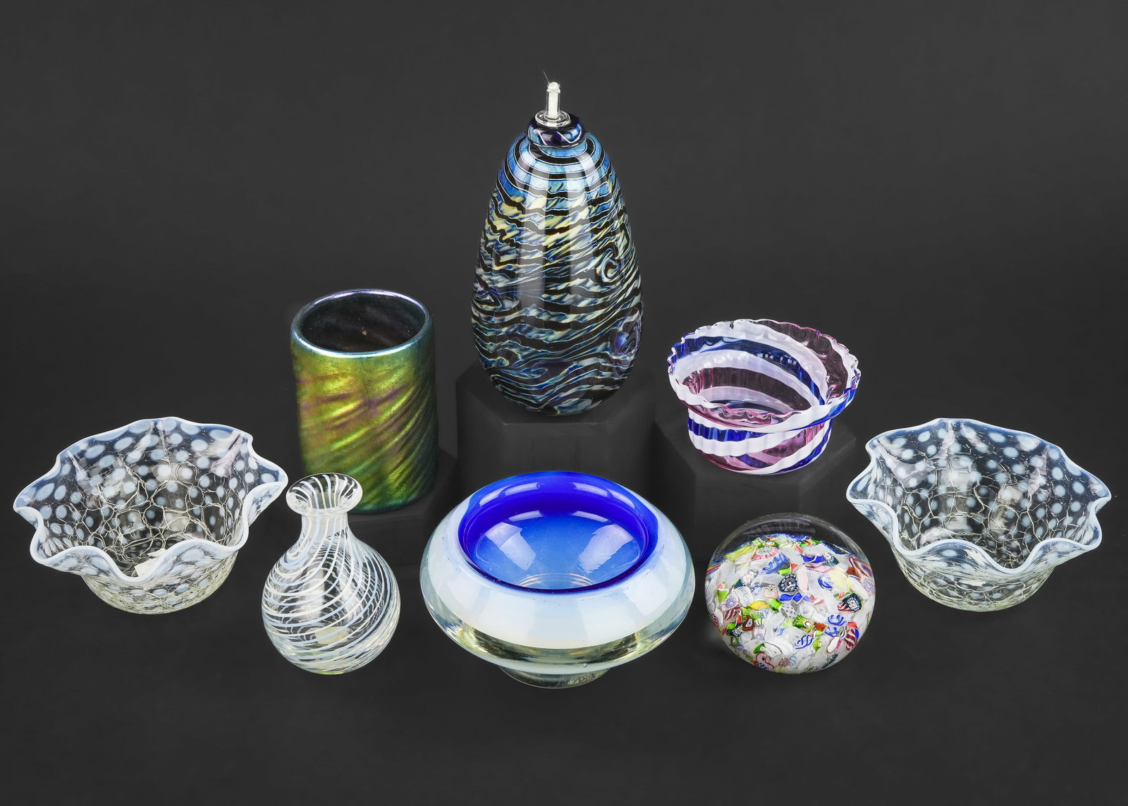 8 Contemporary Art Glass Decorative Items: Group of 8 contemporary art glass decorative items including a Susan Mueller Maytum Studios 1983 oil lamp, iridescent tumbler signed "Cook '86", 2 opalescent hobnail ruffled finger bowls, millefiori