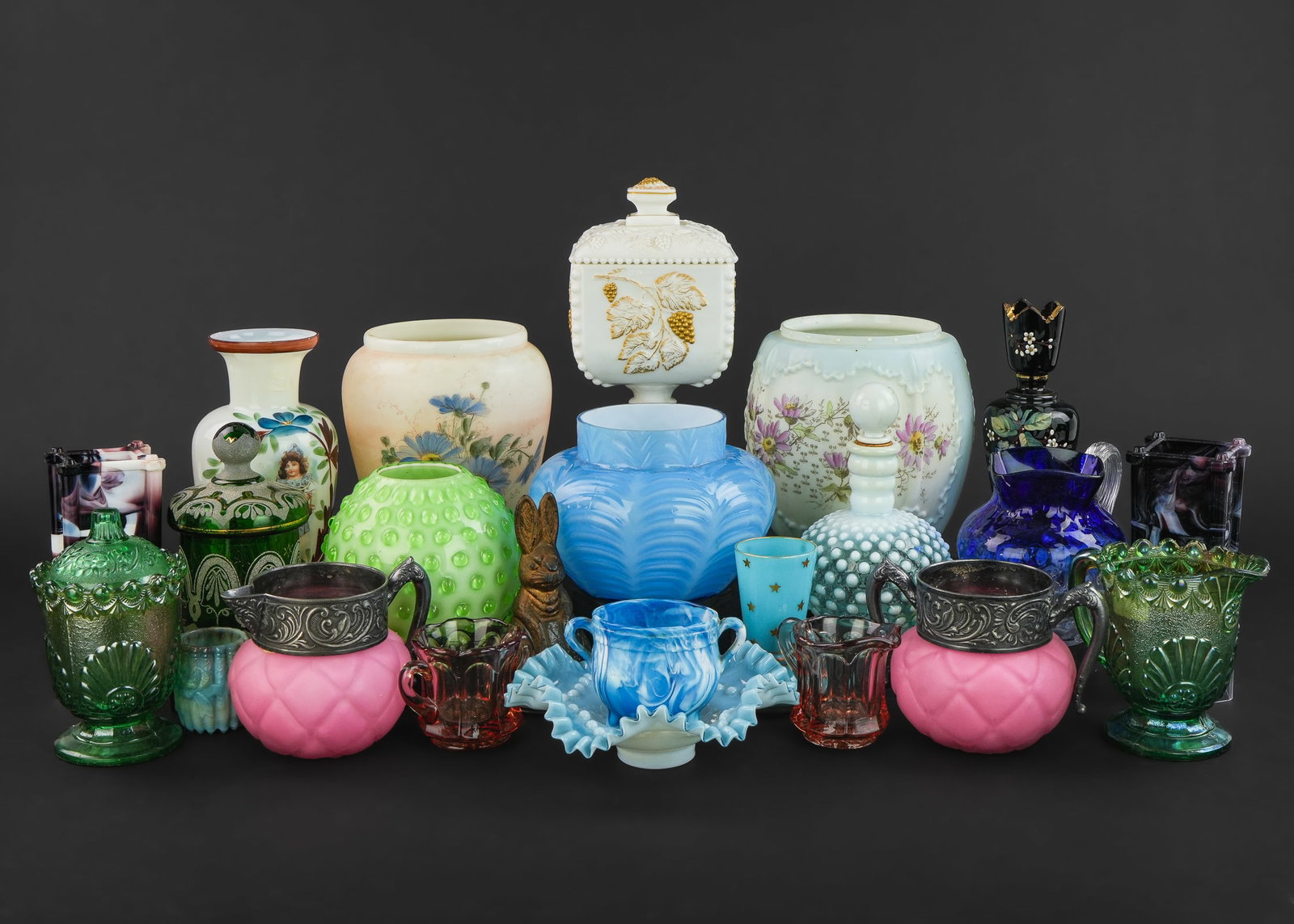 Victorian Glass Tableware and Decorative Items: Lot of Victorian glass tableware and decorative items including amethyst slag agate vases, Consolidated pink quilted satin sugar and creamer set, coralene covered dresser jar, blue cased glass vase, m