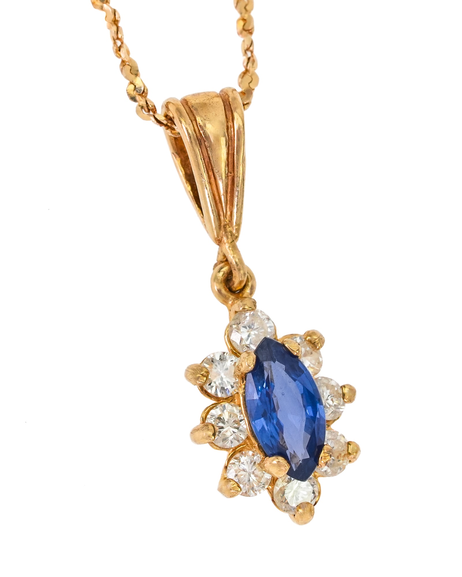Sapphire & Diamond Pendant: 14k yellow gold chain with a .65 ct marquise cut sapphire and 8 .05 ct round cut diamond surround. 3.5 grams t.w.
