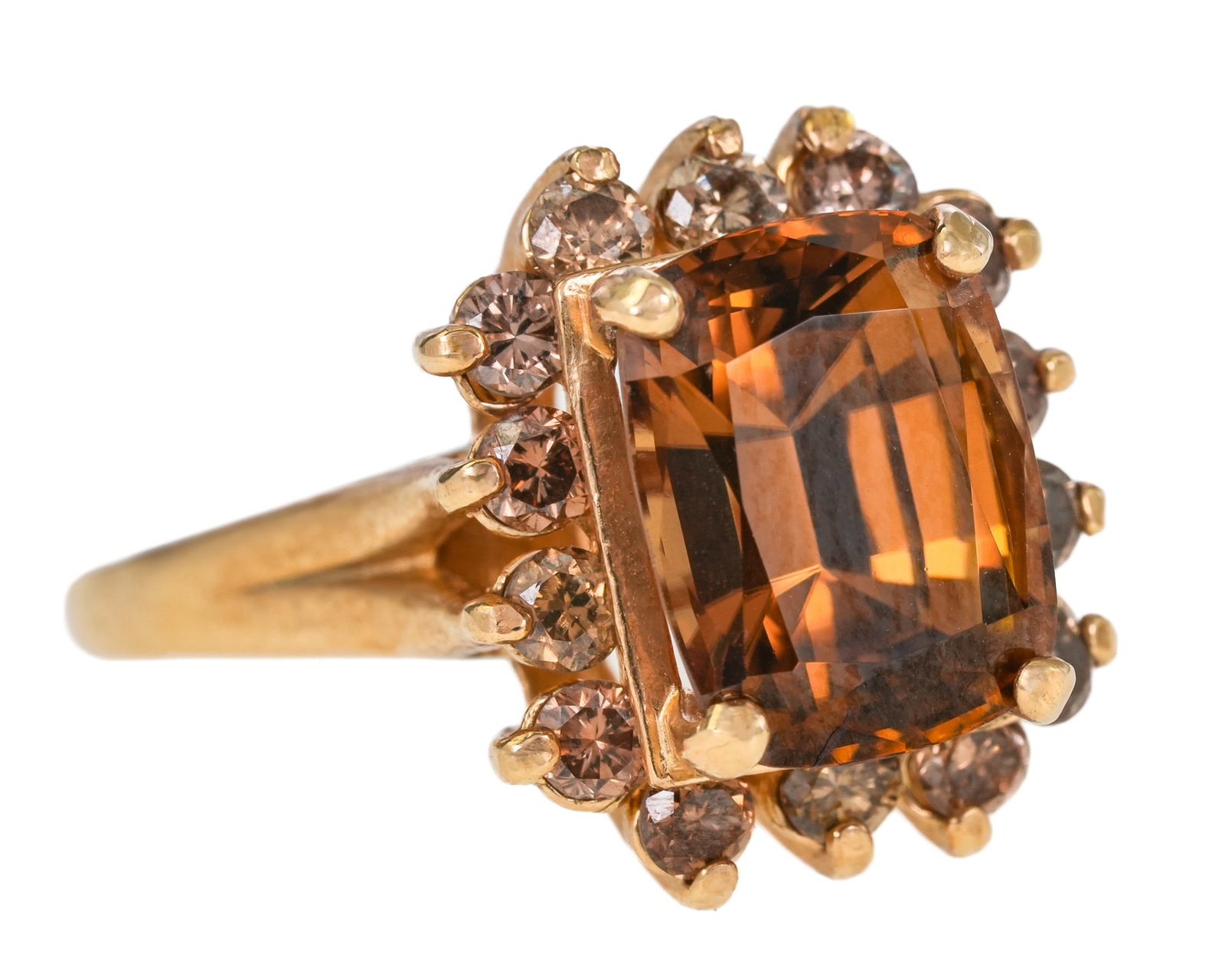 5.4 CT Yellow Zircon & Diamond Ring: 14k yellow gold ring set with a emerald cut 5.4 CT natural yellow zircon measuring 10 mm x 8 mm x 6mm, with a 14 round cut diamond surround, approx. .5 cts.t.w. diamonds. Ring size 7. 6.08 grams t.w.