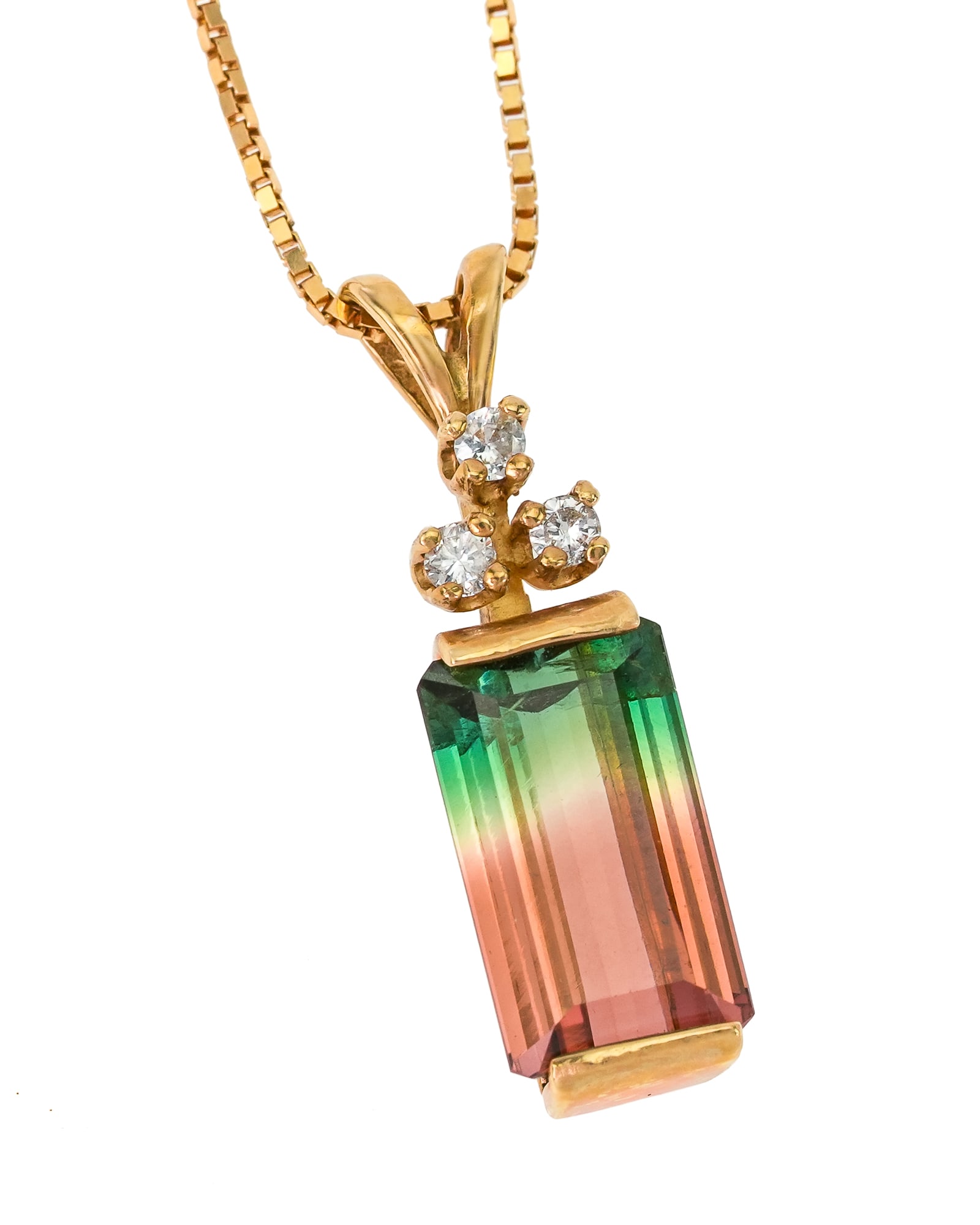 Watermelon Tourmaline & Diamond Pendant: 14k yellow gold chain and pendant with a tri-colored tourmaline measuring 11 mm x 6.8 mm x 4.5 mm with 3 small diamonds. 4.9 grams t.w.