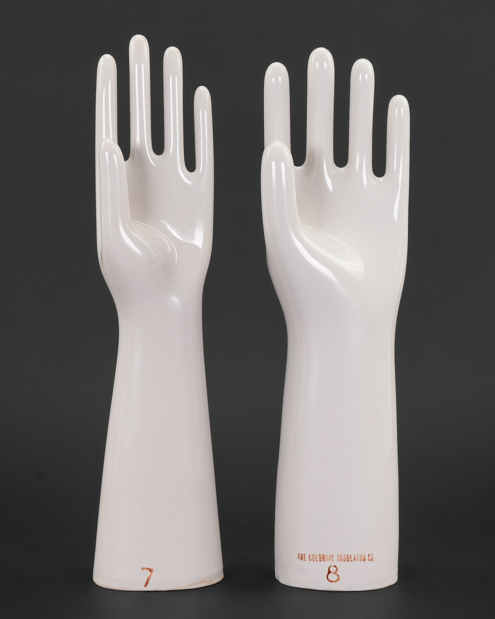 Colonial Insulation Co Glove Molds: Two vintage Colonial Insulation Co. porcelain glove molds sizes 7, 8, ht 14"