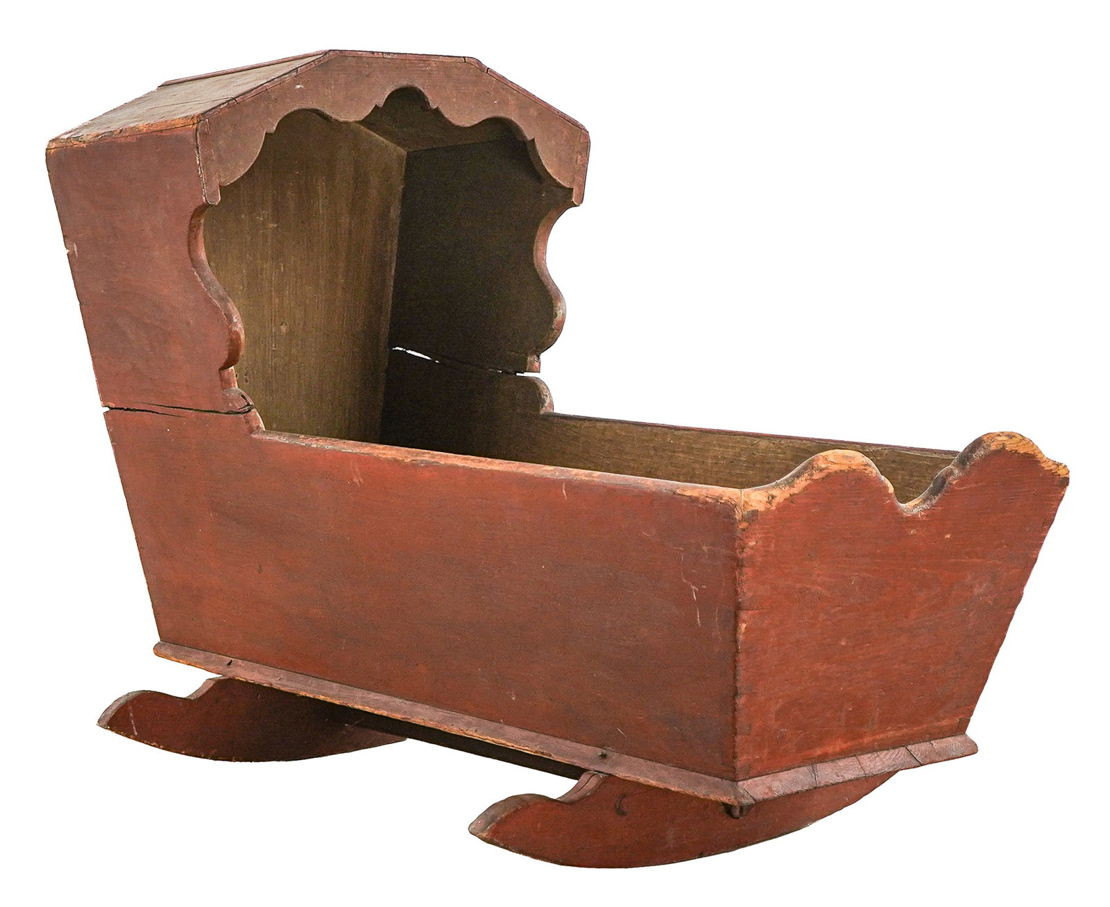 19th c Cradle & Dolls Cradle: Early 19th c hooded cradle in worn original red paint. 38" long, 19"wide, 28"h. With a near matching hooded dolls cradle, dovetail construction with a note on bottom "Made by John Prince while at