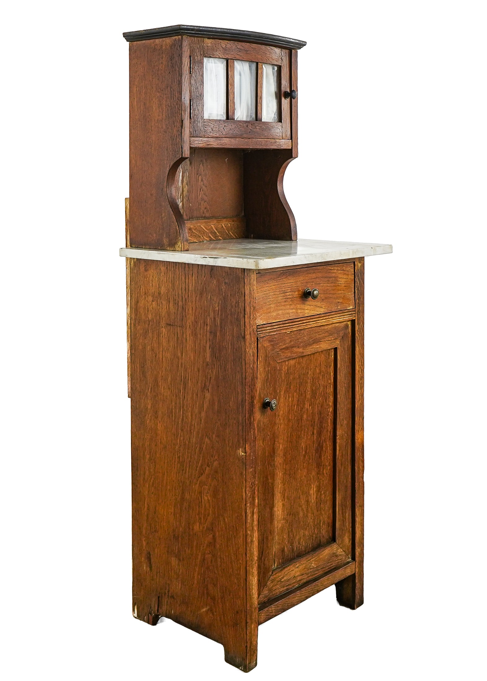 Small Oak Marble Top 2 Part Cabinet: Ca. 1900 oak 2 part cabinet. Upper section with single door having 3 small beveled glass panes. Sitting on a marble shelf over single drawer and door. 49"h, 15"w, 13" d. Marble overhang not measured.