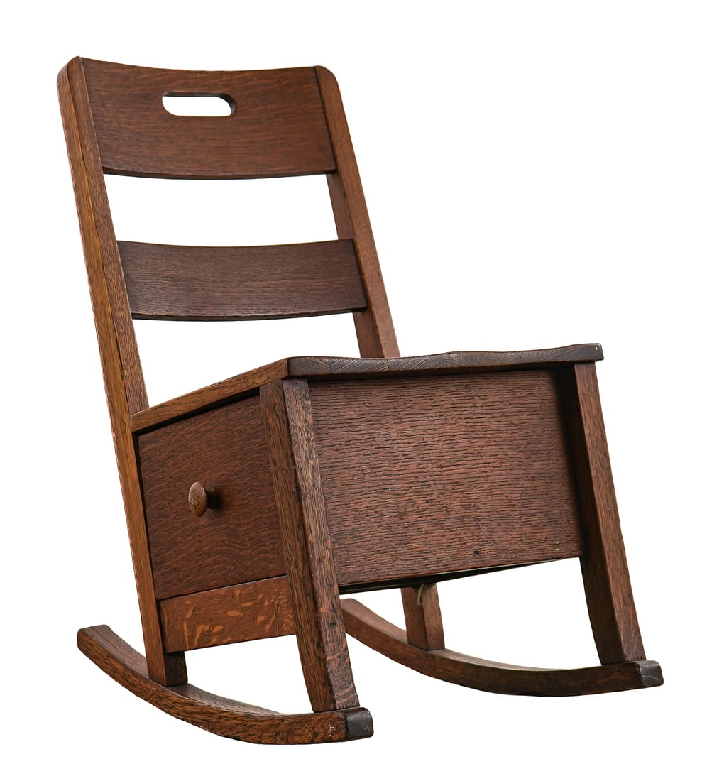 Arts & Crafts Rocking Chair with Drawer: Ca. 1910 Arts & Crafts pegged construction rocking chair with box seat and side drawer. Drawer with spool or pen shelf. Back with pierced hand hole. 28" to top of back, 16" wide, 22" deep (length of