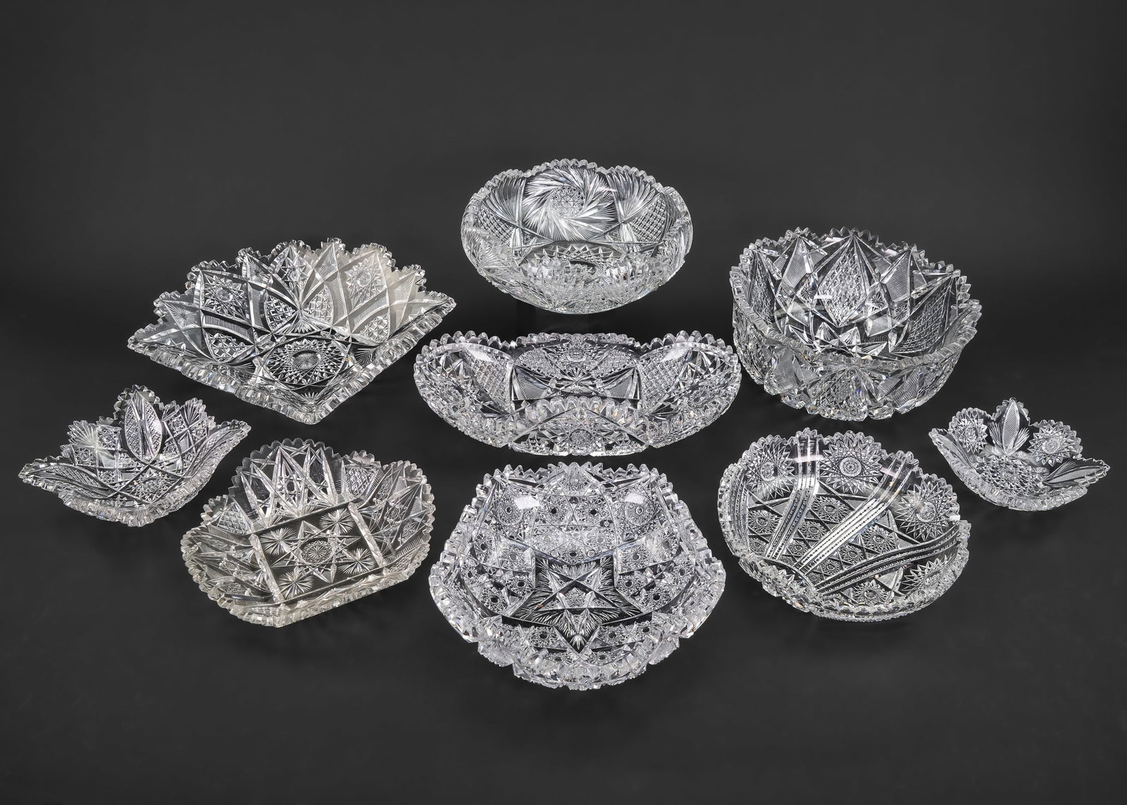 Group of 9 Unusual ABCG Cut Glass Items: Group of 9 ABCG American Brilliant Period Cut Glass items in unusual forms including 4 square bowls with folded sides, pentagon star form bowl, flared rim bowl, asymmetrical patterned dish, concave