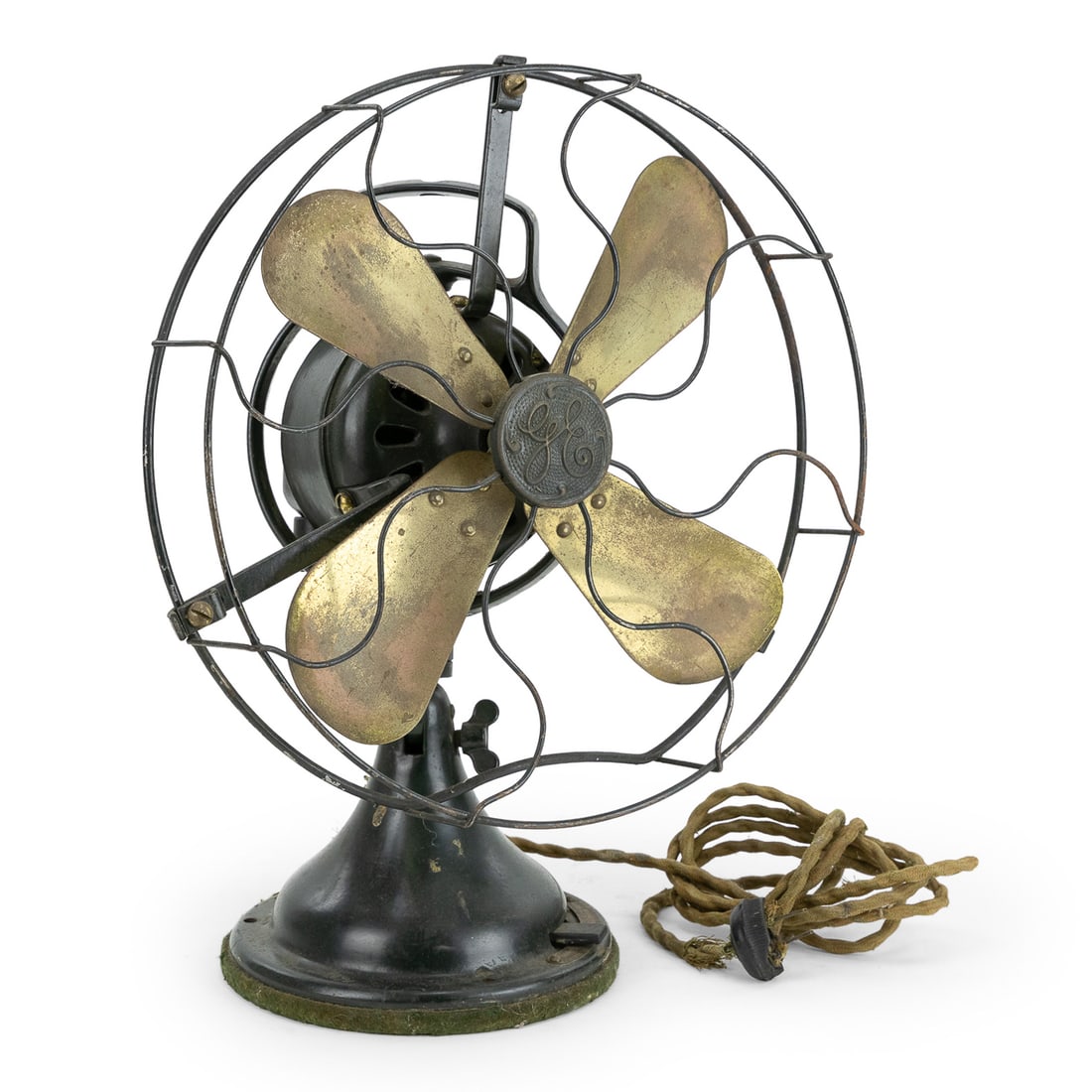 1920s General Electric Brass Blade Fan: 1920s General Electric Schenectady, NY oscillating tabletop fan having brass blades and cast iron and steel case in original dark green painted surface. Untested, original cloth covered cord in need