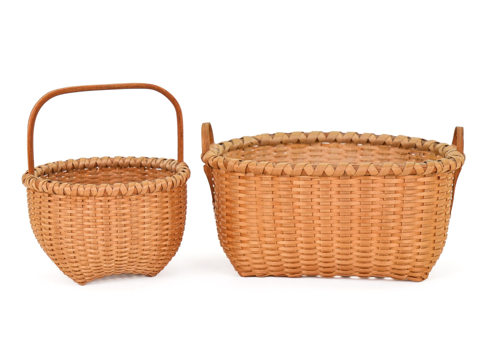 Martha Wetherbee Miniature Baskets: Two signed Martha Wetherbee miniature baskets, signed MW 83, MW 85 on bases, diameter 3 1/2', length 6"