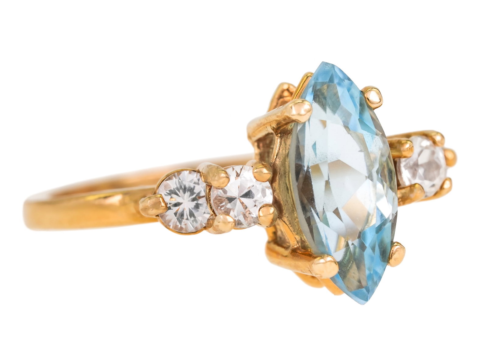14k marquise Aquamarine Ring: 14k yellow gold ring with 1.4 ct marquise cut aquamarine with 4 small white sapphires. Ring size 6 1/2. 3.4 grams t.w.
