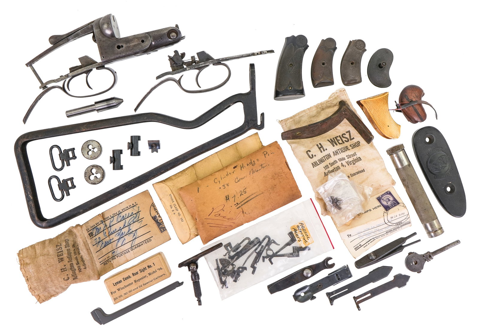 Firearm Parts: A group of firearm parts including a Parker Bros. shotgun receiver with double triggers, sn. 133011 pat. 1889. A British Sten loop stock / skeleton stock for a submachine gun Mk. II or III models.
