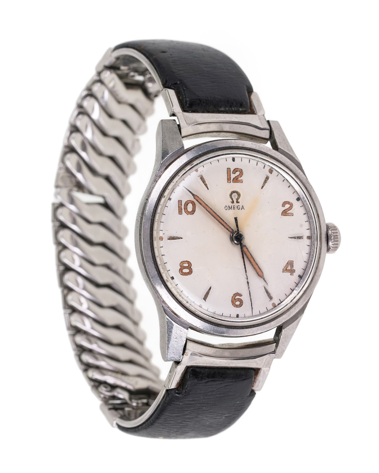 Ca. 1950 Vintage Omega Men's Wrist Watch: Ca. 1950's vintage Omega manual wind men's wrist watch. Stainless steel 33 mm diameter round case, aged white dial, alternating Arabic numerals and hash marks. Elastic back steel & black leather