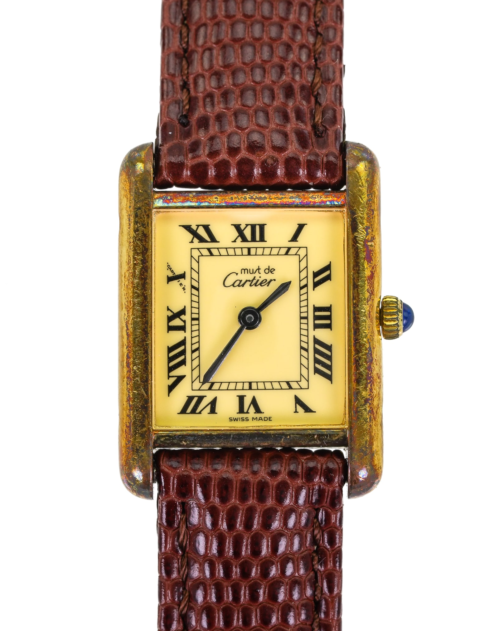 Ladies Gold Cartier Tank Wrist Watch: Ladies gold Cartier Tank wrist watch. 20 mm wide case. Blue sapphire, Marked on reverse, Cartier Paris 925 Argent Plaque or G 20 m Swiss. 3 029292. Edge of case marked 6002 6. Like new brown