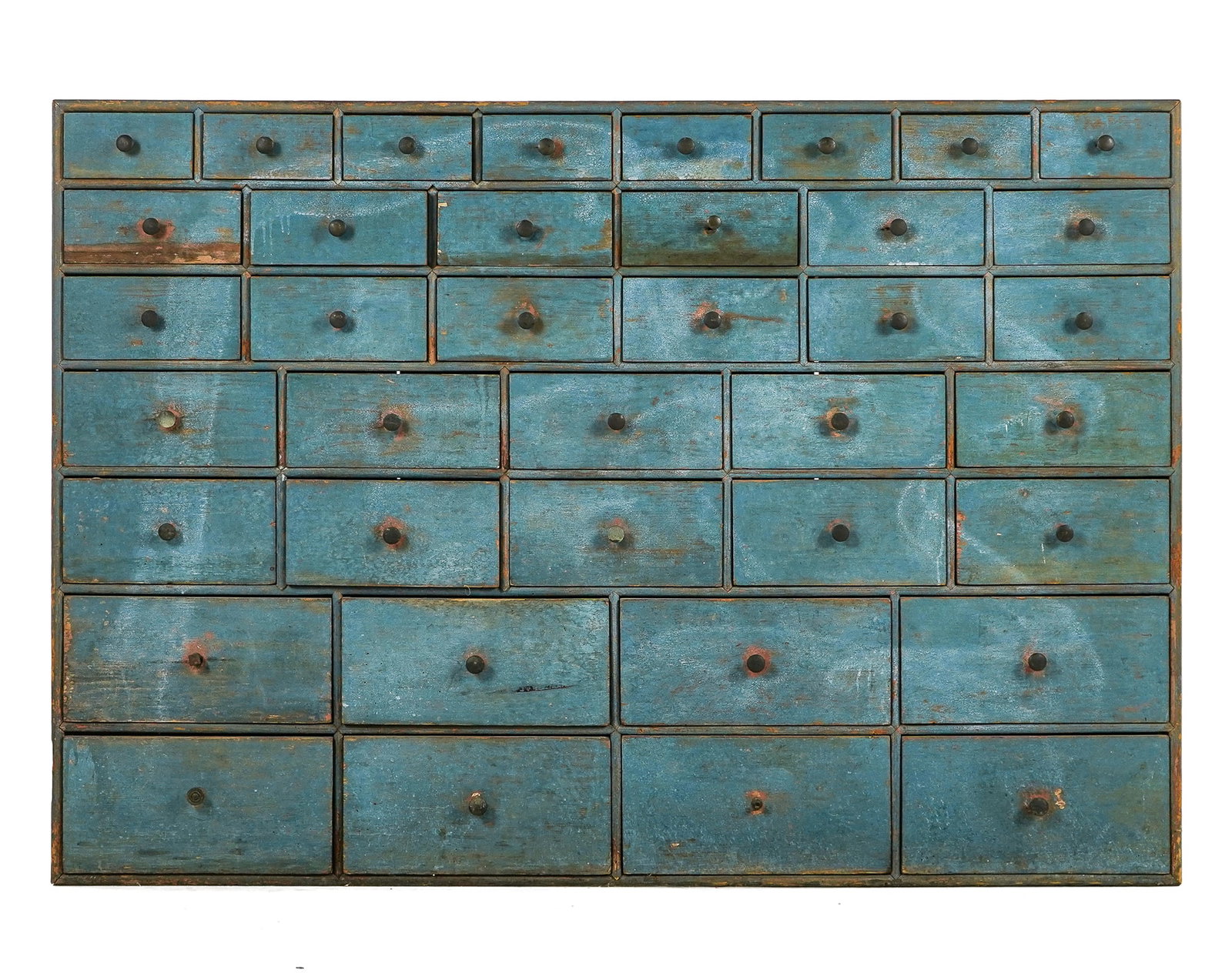 circa 1800 Blue Painted Pine Apothecary drawers: New England Early 19th c pine dovetail case with 38 graduated drawers in original robin's egg blue paint, 37 x 53 x 10.25"