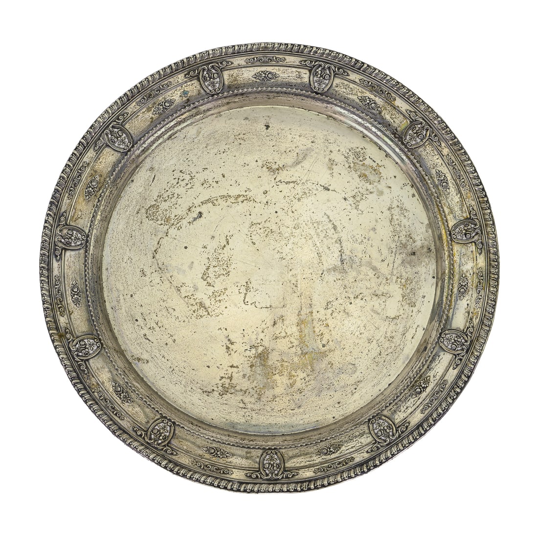 Wallace Round Sterling Serving Tray: Mid 20th c. Wallace round sterling silver serving tray having ruffled gadrooned edge and reticulated floral cartouches, some scratches and imperfections dia. 12" 17.1 ozt.