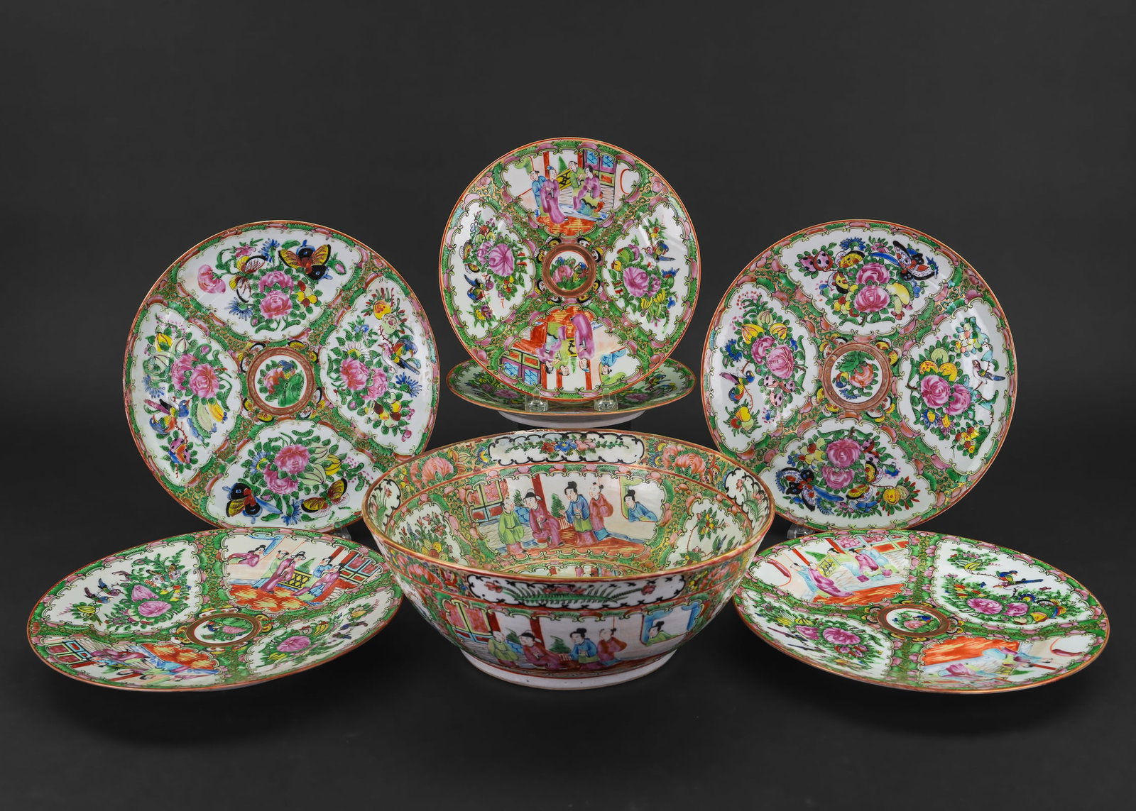 Chinese Rose Medallion Bowl and 6 Plates: 7 pcs. late 19th c. Chinese Export Rose Medallion porcelain tableware including small punch or centerpiece bowl, 6 dinner plates of various forms, all having fine enameled decoration of garden flowers