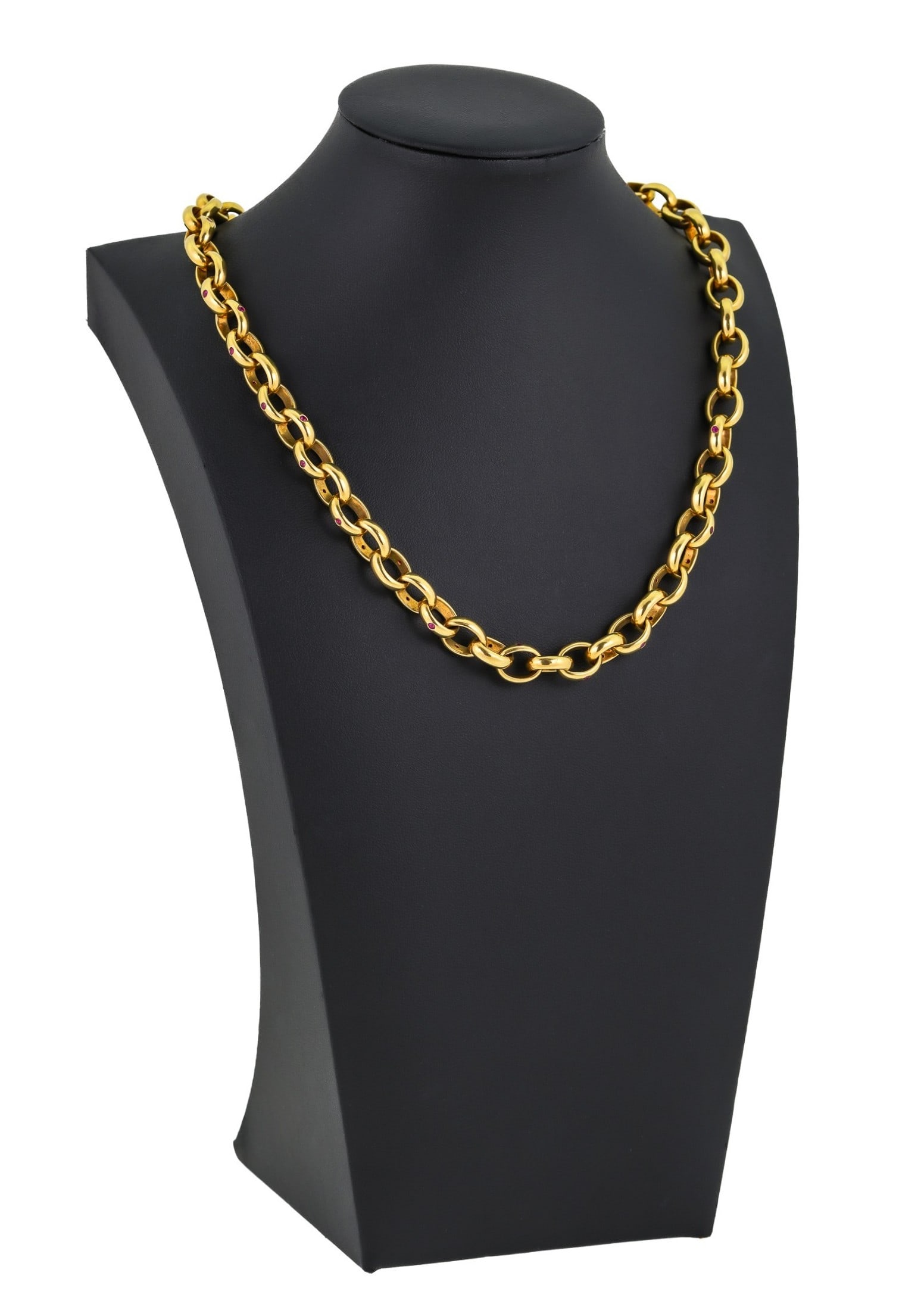 18k & Ruby Link Necklace: 18k yellow gold heavy link necklace. Each link has a .02 ct round cut ruby. 19" long, marked 750 with hallmark, 117.4 grams t.w.