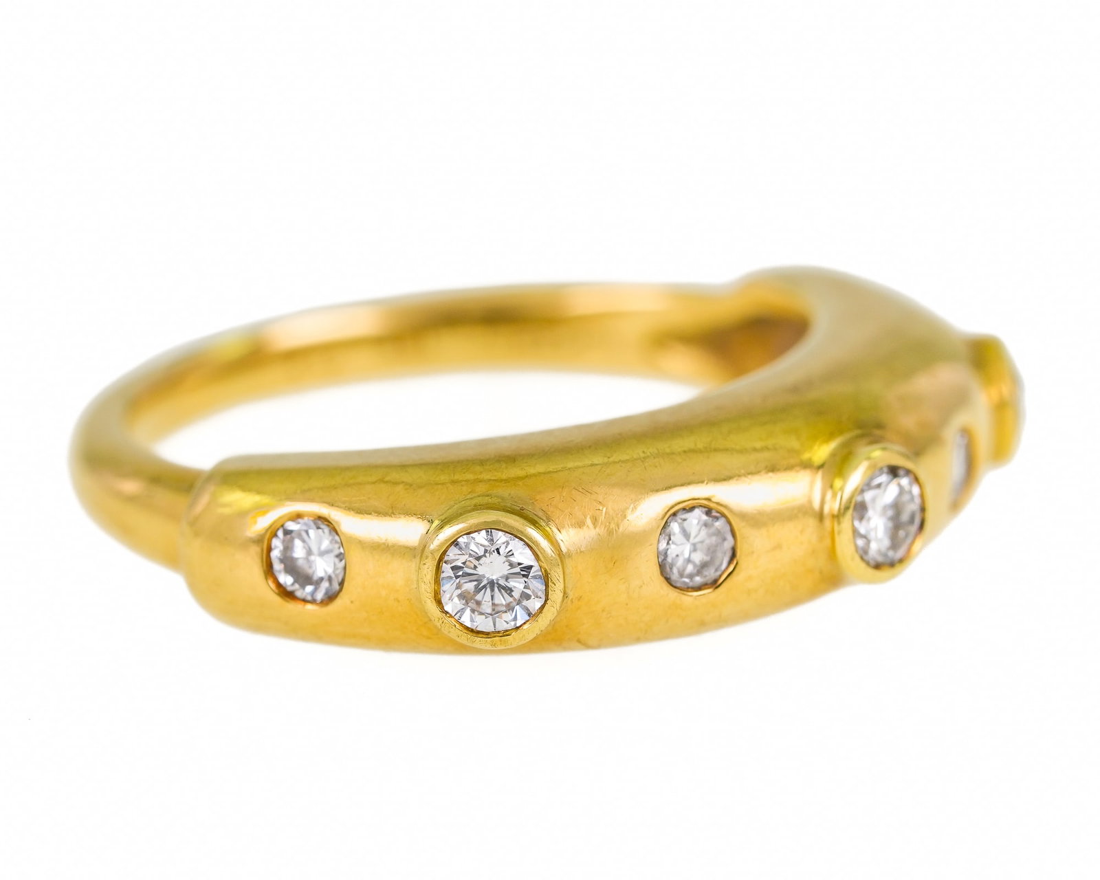 Koplewitz 18k & Diamond Ring: 18k yellow gold ring set with 7 bezel set round cut diamonds. 4 .06 ct diamonds, and 4 .08 ct diamonds in a raised bezel. Ring size 7. Signed Koplewitz 18k. 8 grams t.w. Jane Koplewitz - noted