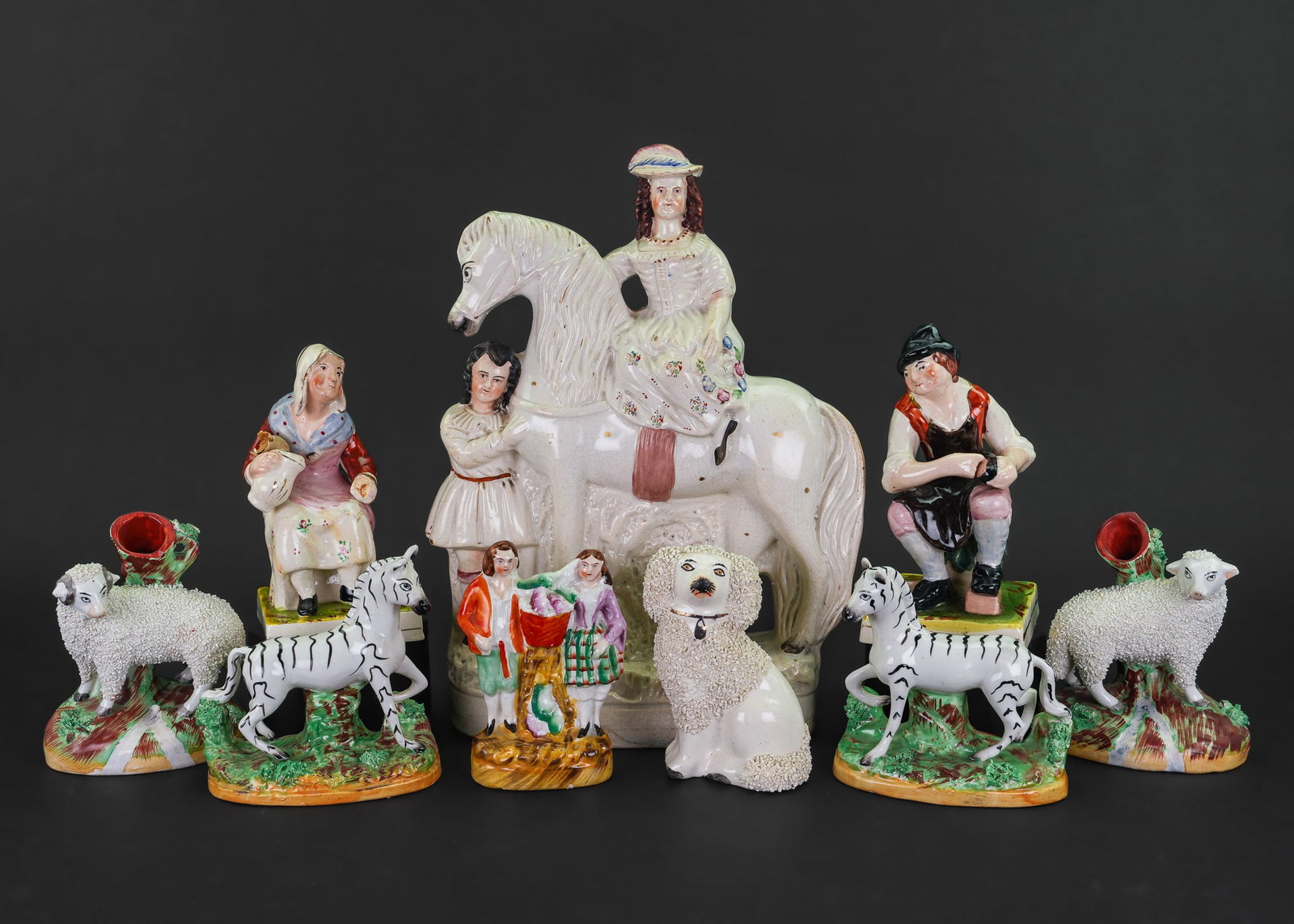 Collection of 9 Staffordshire Pottery Figures (1 of 1)