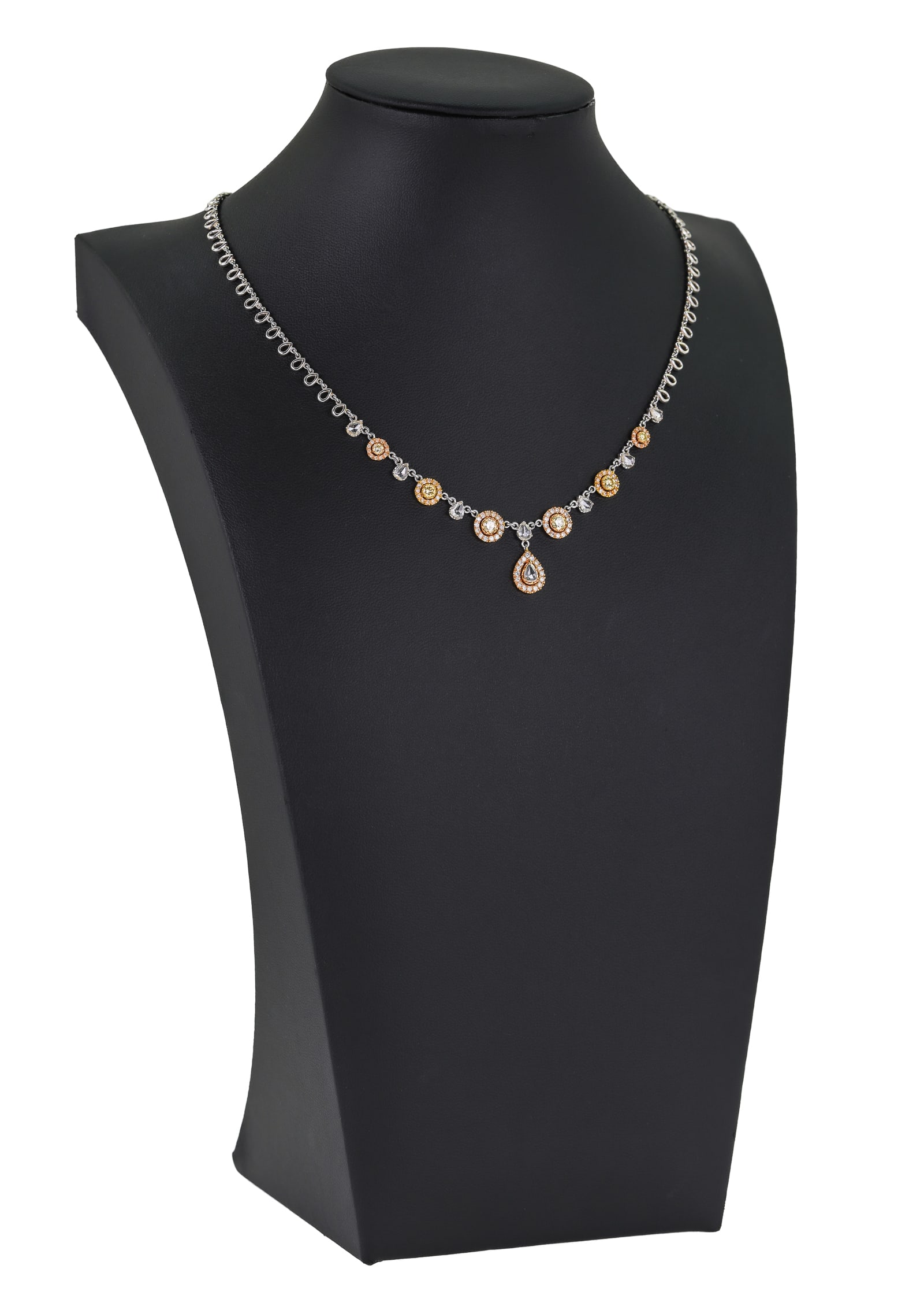 18k, Old Mine Cut, & Champagne Diamond Necklace: 18k white gold loop design necklace having bottom section with 7 old mine cut pear shape diamonds, 5 mm x 3 mm x 2 mm approx. .2 cts each. With alternating graduated round cut champagne diamonds in