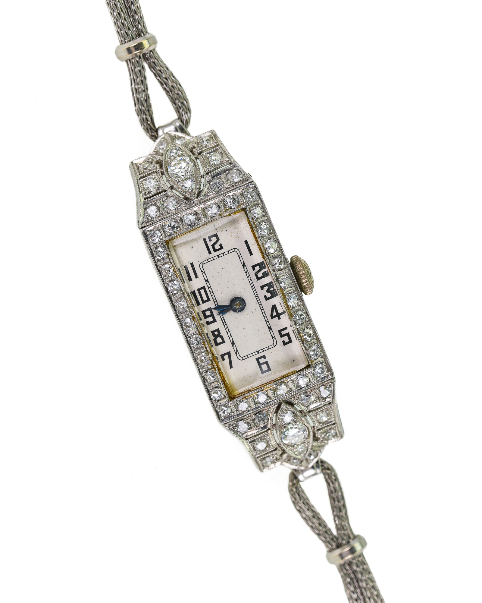Art Deco Ladies Platinum & Diamond Wrist Watch: Glycine Watch Co. Art Deco ladies platinum wrist watch. White dial, black arabic markers. Case set with 2 .1 ct round cut diamonds and 56 .02 ct round cut diamonds. Approx 1.3 cts.t.w. diamonds. 14k