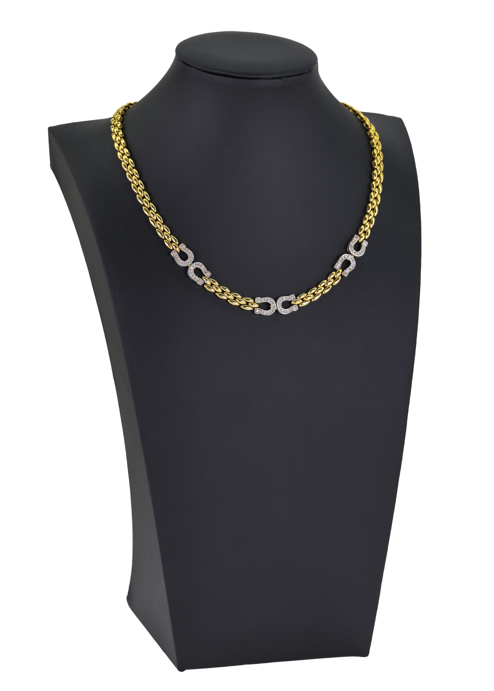 14k, Diamond, & Horse Shoe Necklace: 14k yellow gold necklace with 3 sets of 2 white gold horseshoes set with small diamonds. 16" long. 29.5 grams t.w