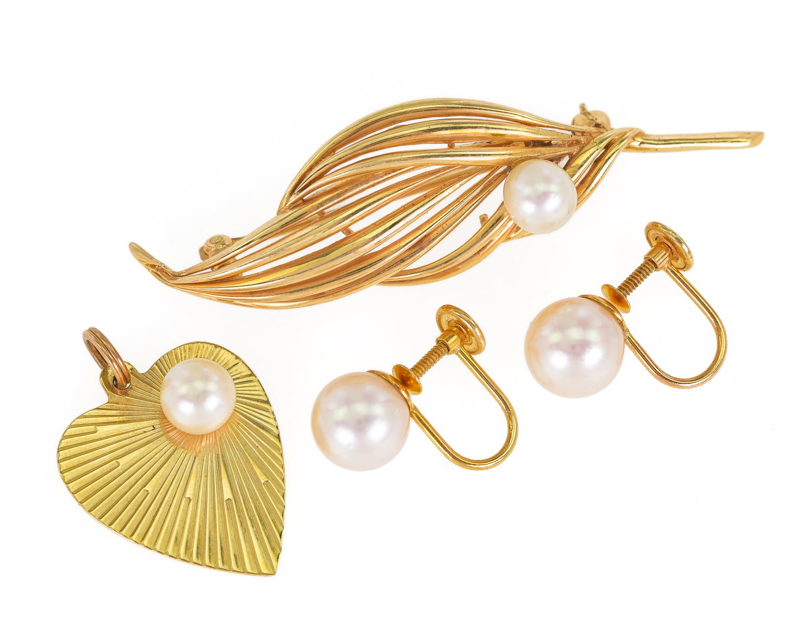 14k & Pearl Jewelry: 3 pieces of 14k yellow gold jewelry including a 14k leaf pin with a 6 mm pearl, 2 1/4" long, pair of 8 mm screw back earrings, and a heart pendant with a 6 mm pearl. 10.4 grams t.w.