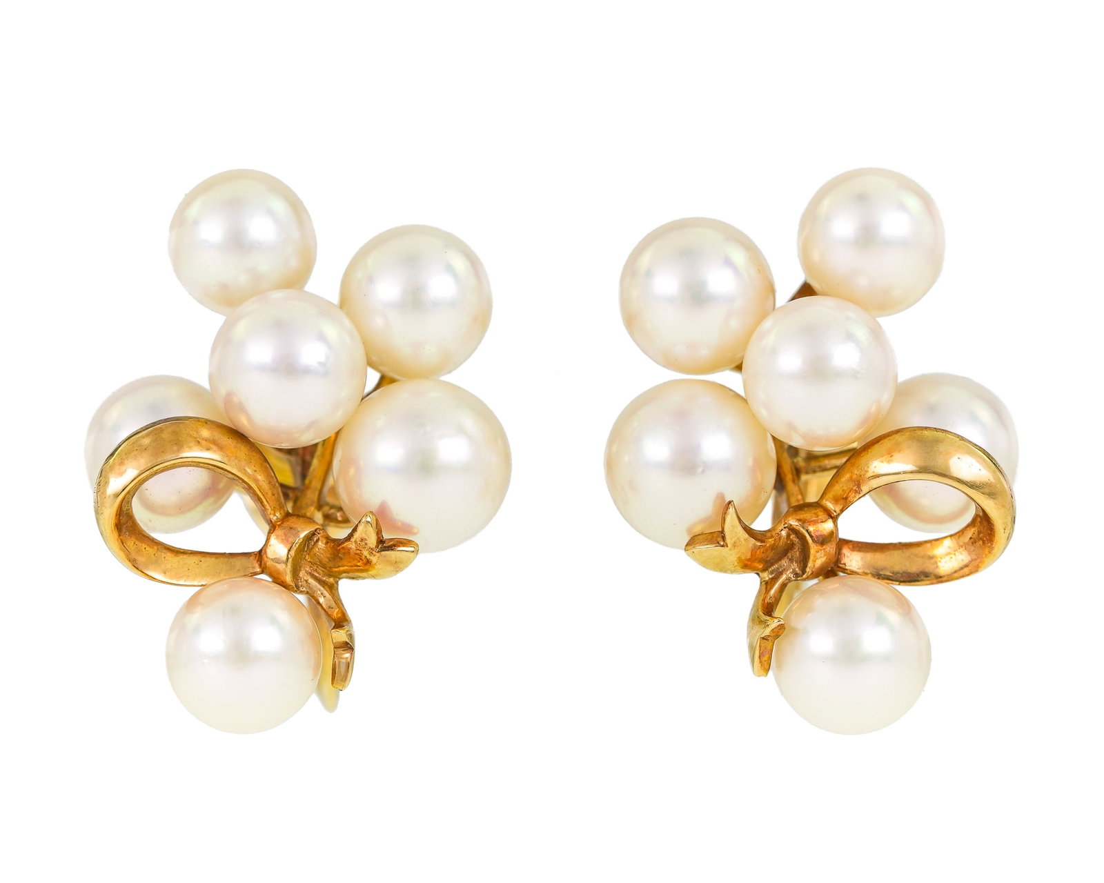 14k & Pearl Cluster Earrings: A pair of 14k yellow gold screw back earrings with 6 pearl cluster on each, 5 mm to 7 mm. 7.3 grams t.w.