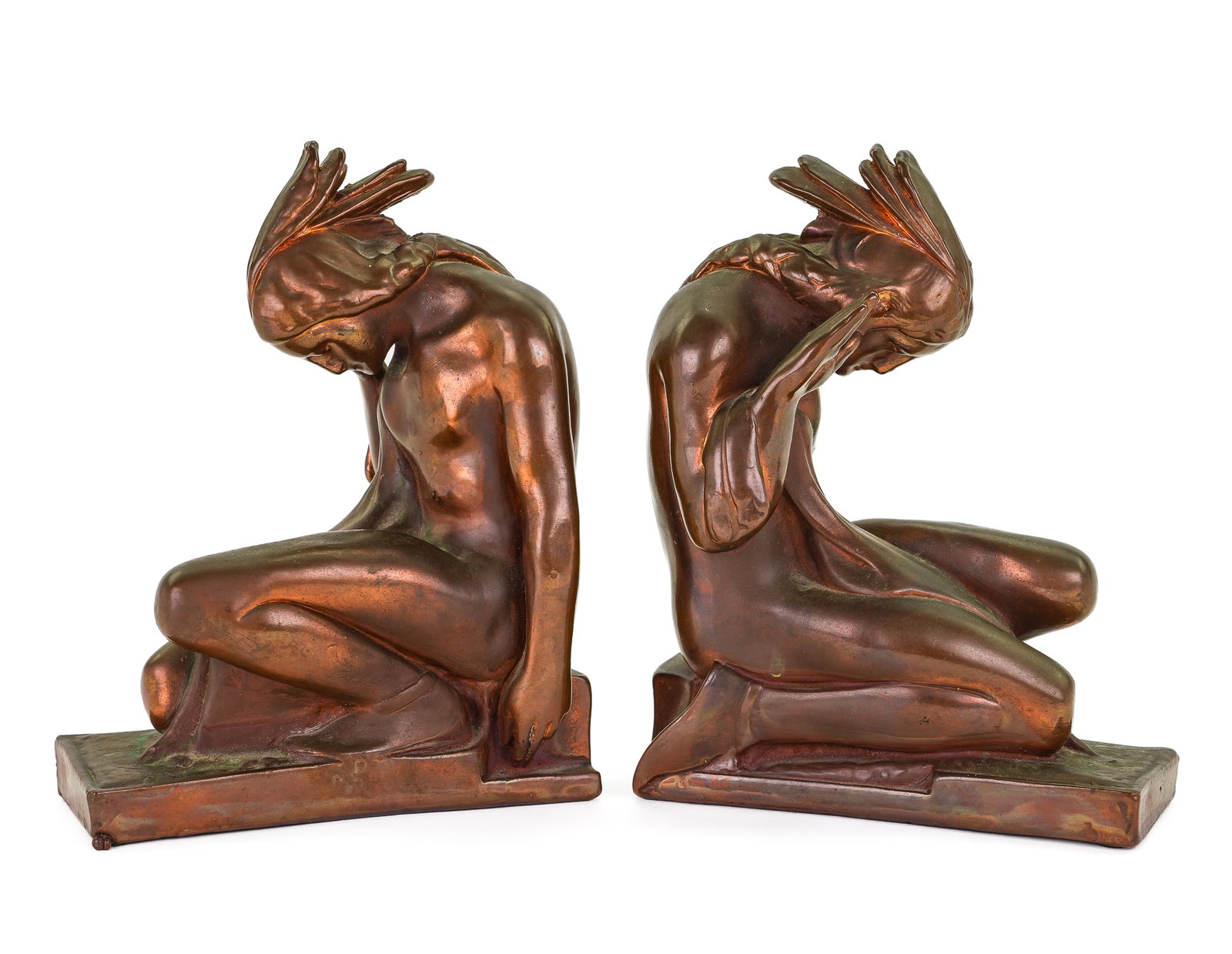 Pompeian Bronze Indian Bookends: Art Deco Era Pompeian Bronze Company bronze clad/ copper jacketed "Kneeling Native American" bookends, after a design by Paul Herzel, good original surface and patina, ht 8", length 6 1/4"