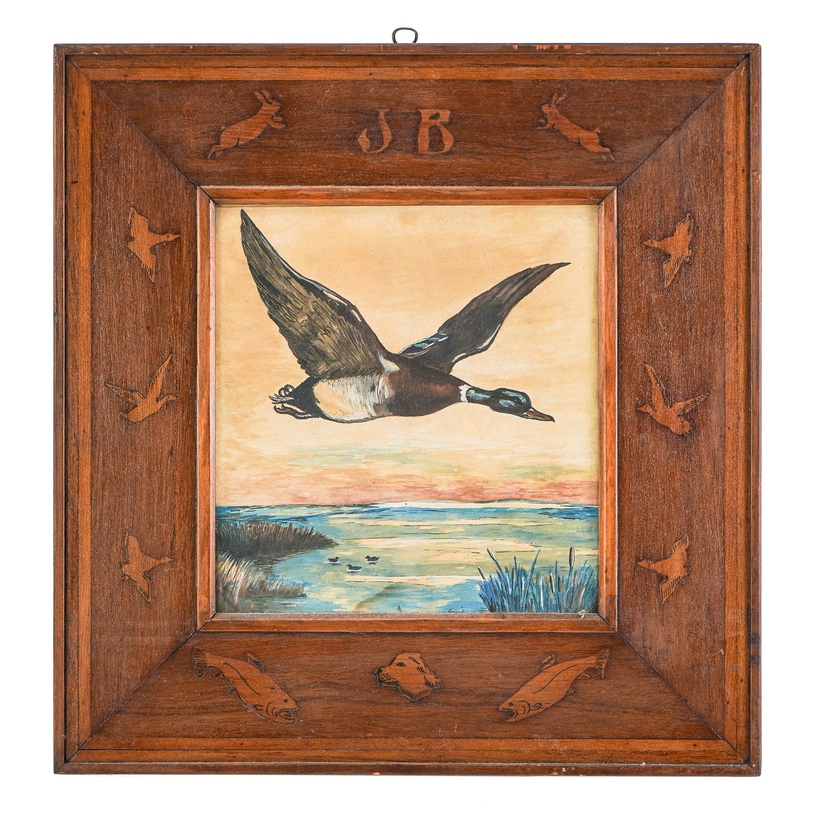 J Belli (AM 20thc) Flying Mallard: J Belli (American 20th c ) Flying Mallard watercolor on paper in folk art inlaid frame decorated with game animals (Dog,salmon, waterfowl and rabbits) and initials JB upper center- 14 x 14" outer