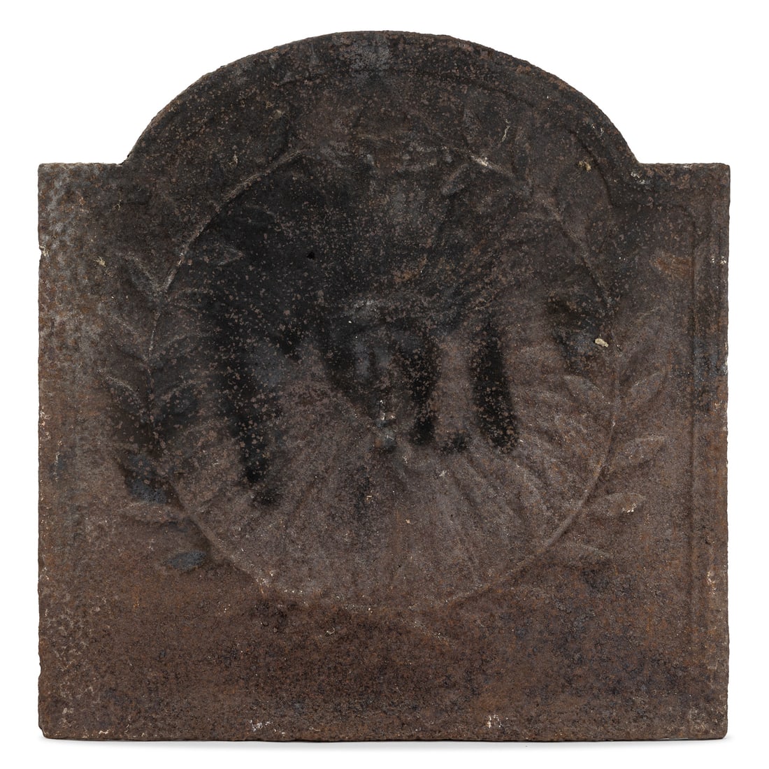 18th c Sun Cast Iron Fire Back: 18th c cast iron tombstone form fire back with center image of a sun with center human face and a exterior wreath ring. 16" x 16"
