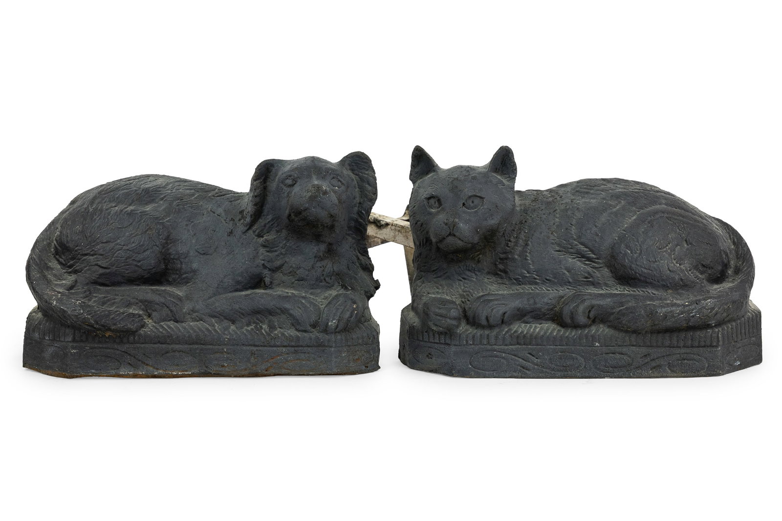 Cat & Dog Andirons: A pair of cast iron andirons. One a lying down cat, other a dog. 12" wide, 8" h. Good condition.
