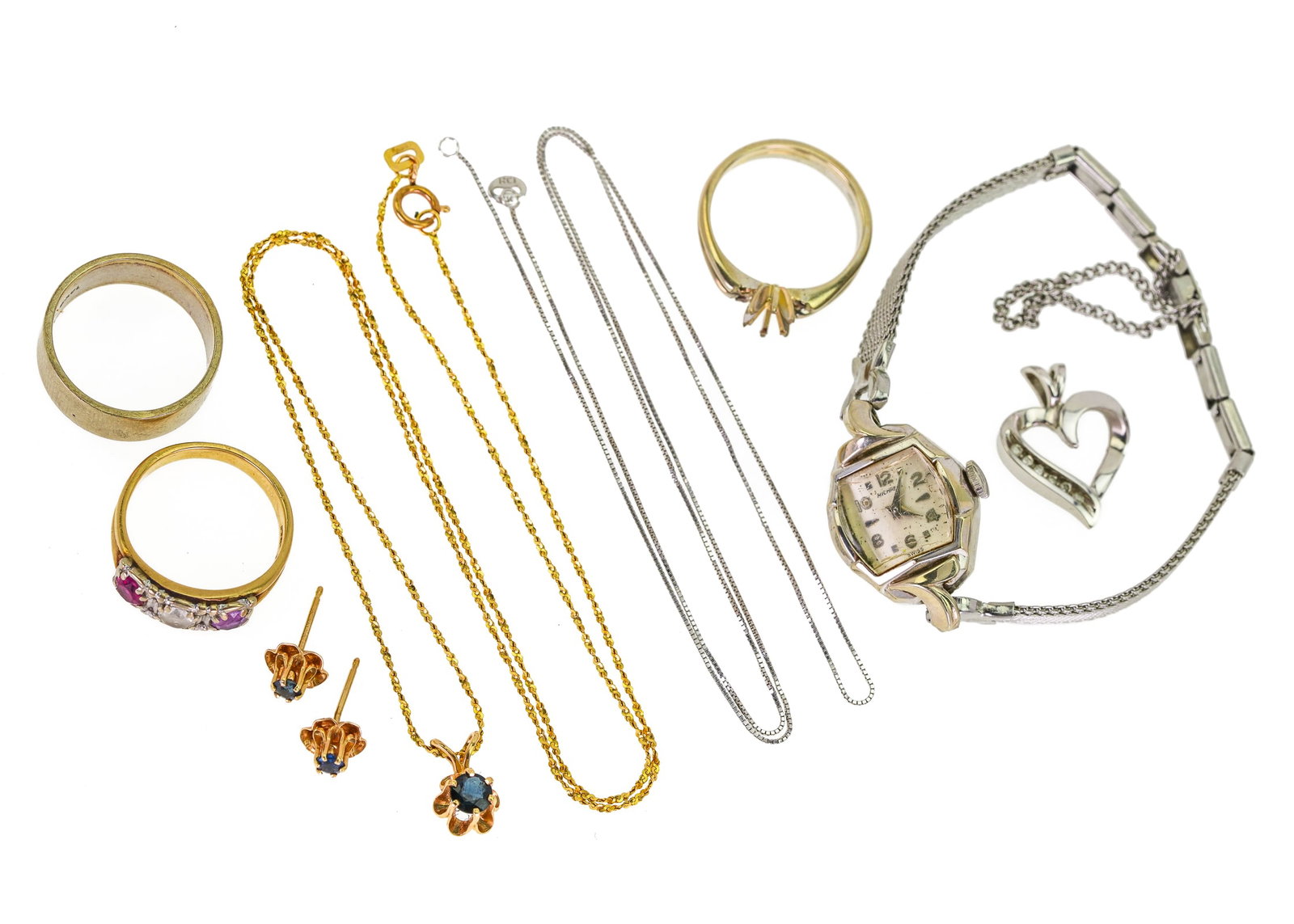 Gold Jewelry: A group of gold jewelry including a pair of 14k y.g flower earrings & pendant with center sapphires. 14k y.g. 5.9 gram band ring. 14k 3 stone ring. 14k ring missing stone. 14k white gold chain. 10k wh