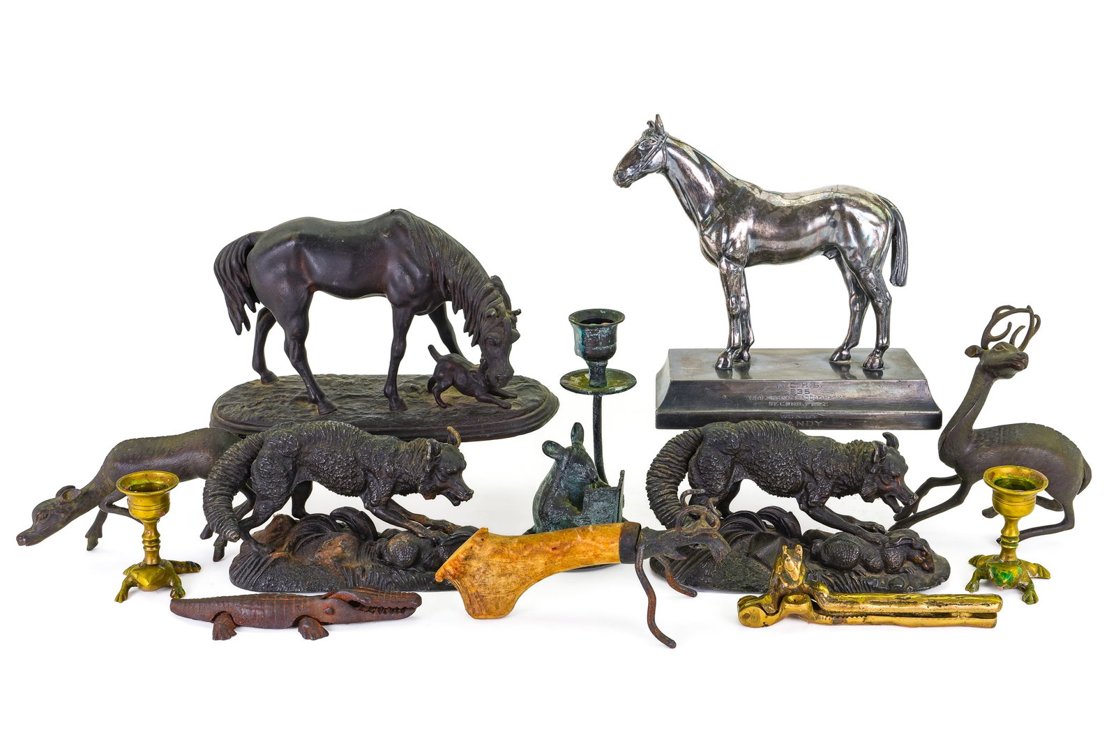 Collection of Cast Metal Decorative Animals: Collection of 12 cast metal decorative animal figures and objects including patinated white metal equestrian figure of horse and dog, pair of white metal fox and hare figures (possibly bookends), 1935
