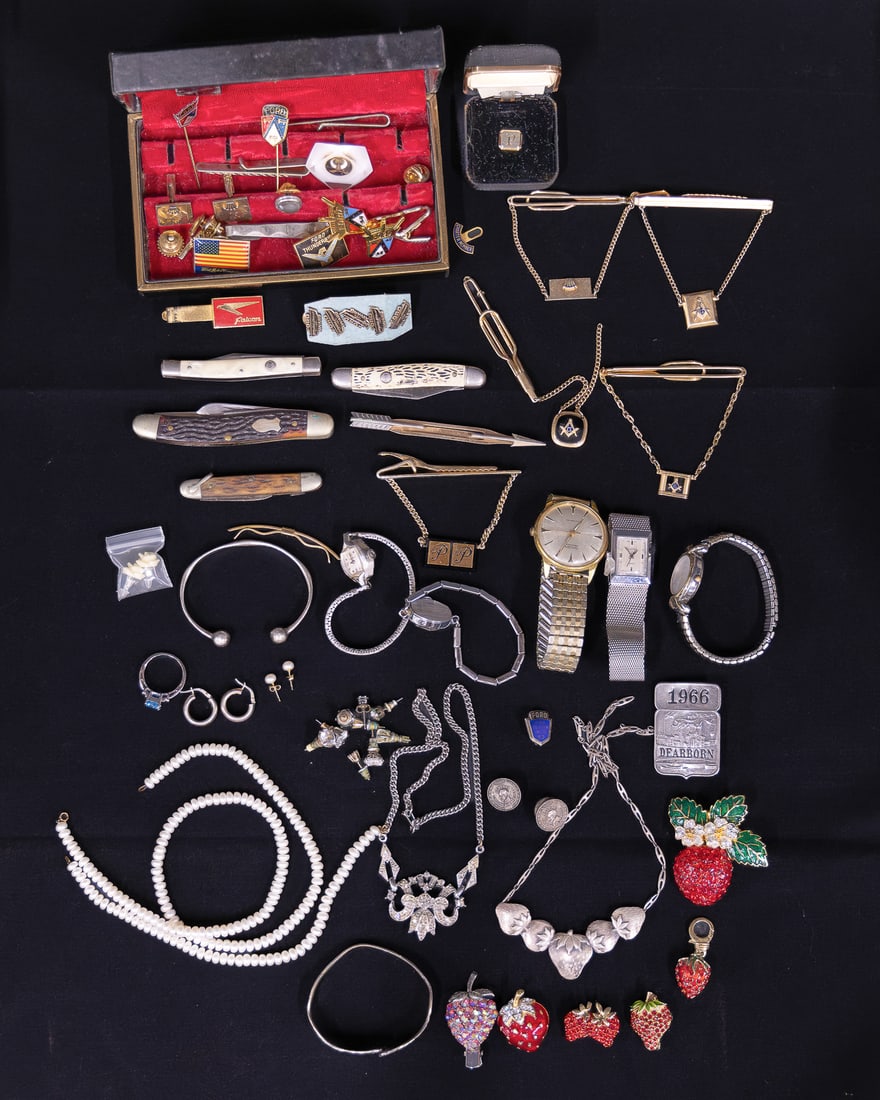 Group of Men's Jewelry: A group of estate jewelry including 14k pearl stud earrings, fresh water pearl necklace, rinestones, sterling strawberry necklace, pocket knives, wrist watches, tie pins, and more.
