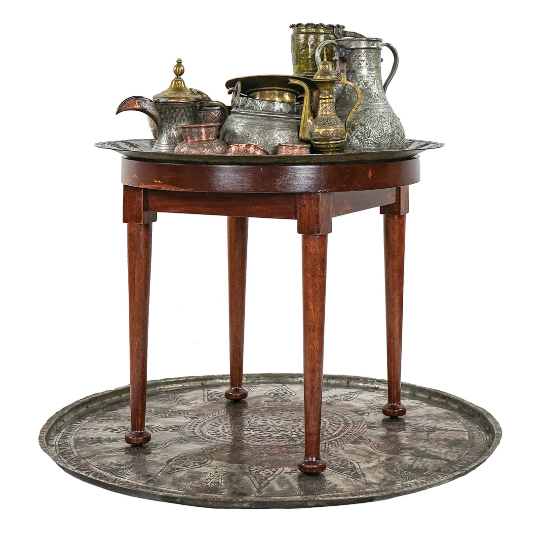 Group of 14 Pieces of Antique Brass: Group of 14 pcs. antique Middle Eastern brass, copper and metalware including large serving tray, charger in wooden end table frame, mixed metals pieces with Arabic text, 3.5" -34"