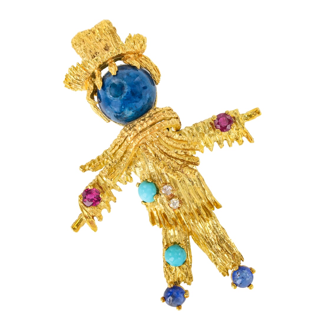 18k Jointed Scarecrow Brooch: 18k yellow gold figural pin of a scarecrow with top hat and scarf. Head is a cabochon blue lapis 12 mm. 2 round cut .2 ct rubies - one in each hand. 2 - .2 ct cabochon sapphires. 2 cabochon
