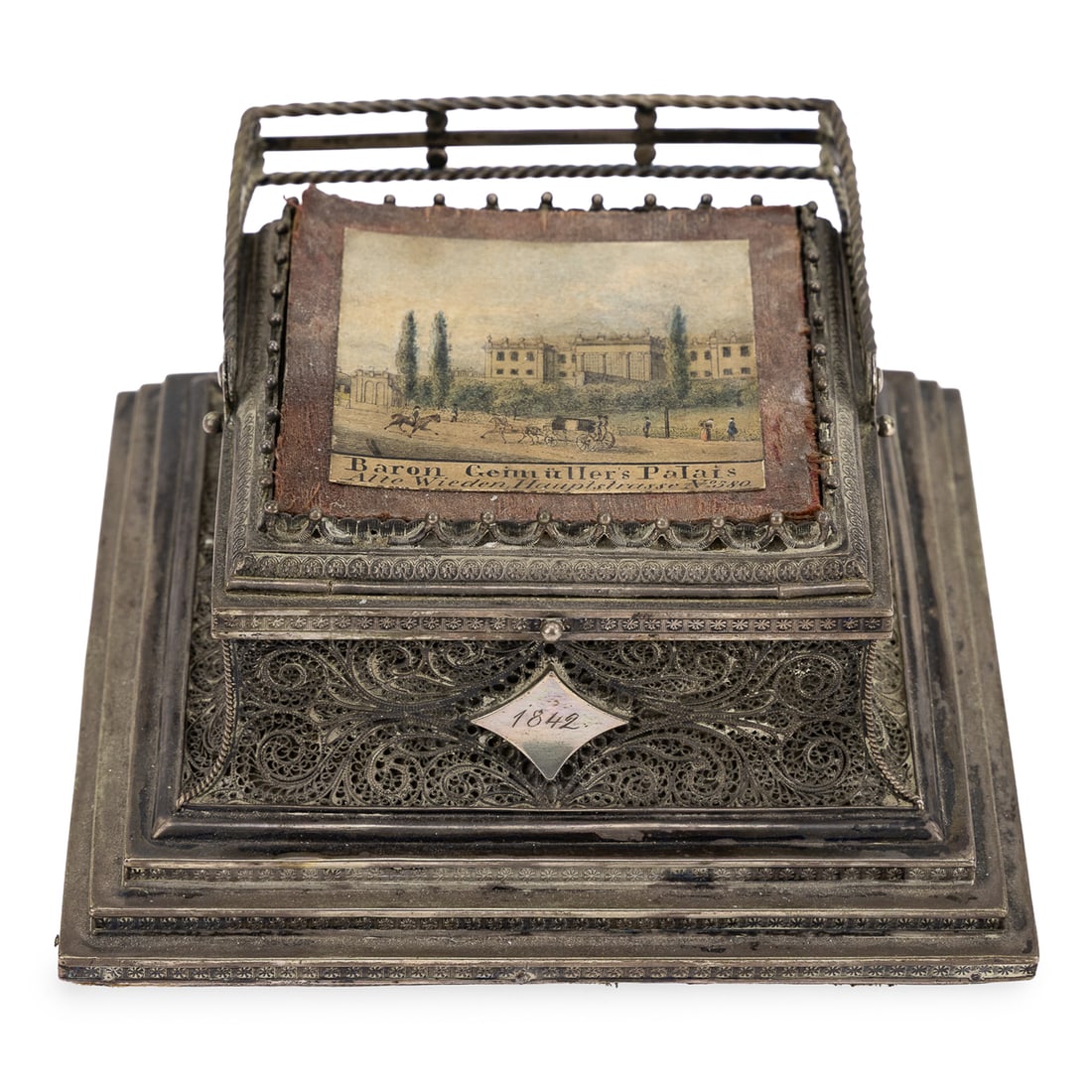 1842 Continental 800 Silver Filigree Box: Dated 1842 Continental 800 German silver filigree jewelry box with openwork swing handle, having top inset with hand colored engraving of Baron Geimuller's Palais, some tarnish, overall good