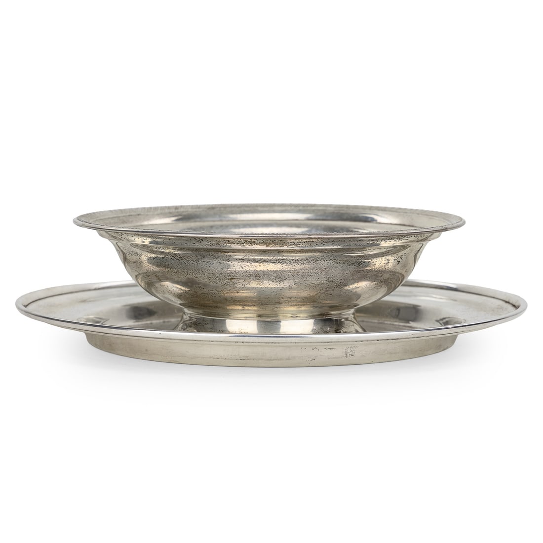 Sterling Footed Bowl and Round Tray: Mid 20th c. sterling silver footed centerpiece bowl with gadrooned rim, accompanied by a round tray with monogram in center 3.25" x 11", dia. 14", 34.2 ozt. some dents