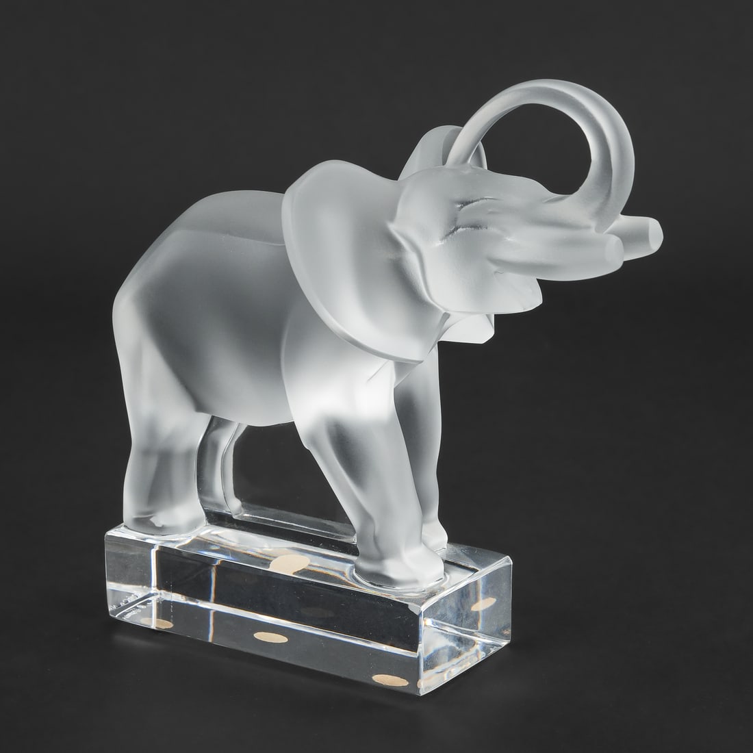 Lalique French Crystal Elephant Figurines: Contemporary Lalique French crystal frosted art glass figure of roaring elephant, overall excellent condition, signed near base, 6.5" x 6"
