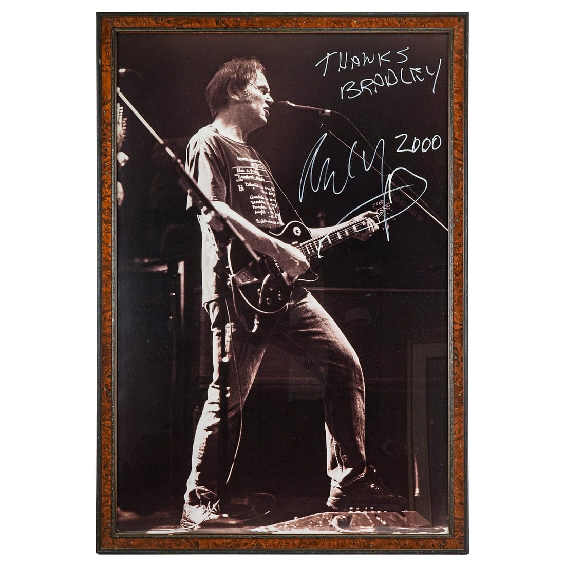 Large Autographed Portrait of Neil Young: Large Autographed portrait of Neil Young dedicated to Bradley Arena in Milwaukee- 48 x 33" as framed.