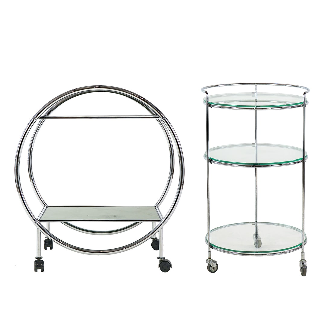 Two Chrome Modern Bar Carts: Two circa 1990 Chrome and Glass bar carts one round with three shelves 32 x 19"diameter one with round disc sides and two smoked glass shelves. 34 x 30 x 18" both in excellent condition.