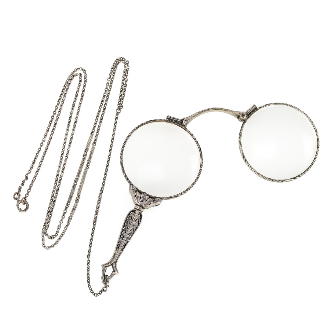 Victorian Sterling Lariat Folding Glasses: Victorian sterling folding engraved glasses. Button released frame. On a sterling lariat chain, 24" long, with 4" drop.