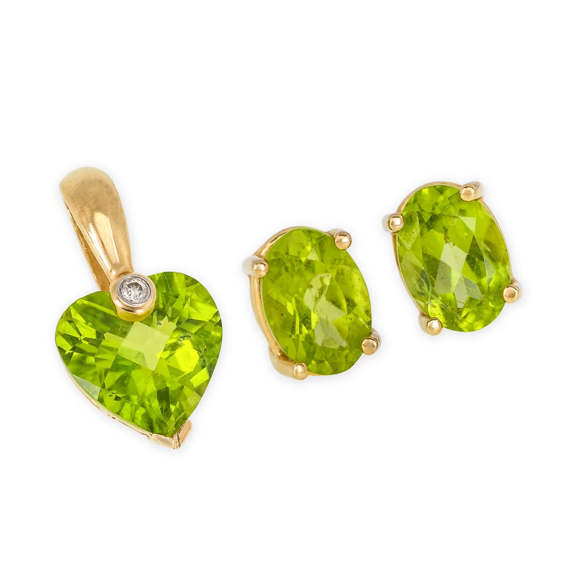 14k Green Tourmaline & Diamond Set: 14k yellow gold green tourmaline & diamond 3 piece set. Pair of oval stud 7 mm x 5 mm x 3mm green tourmaline earrings. With a pendant having a heart cut green tourmaline 8mm x 8mm x 3 mm with a small