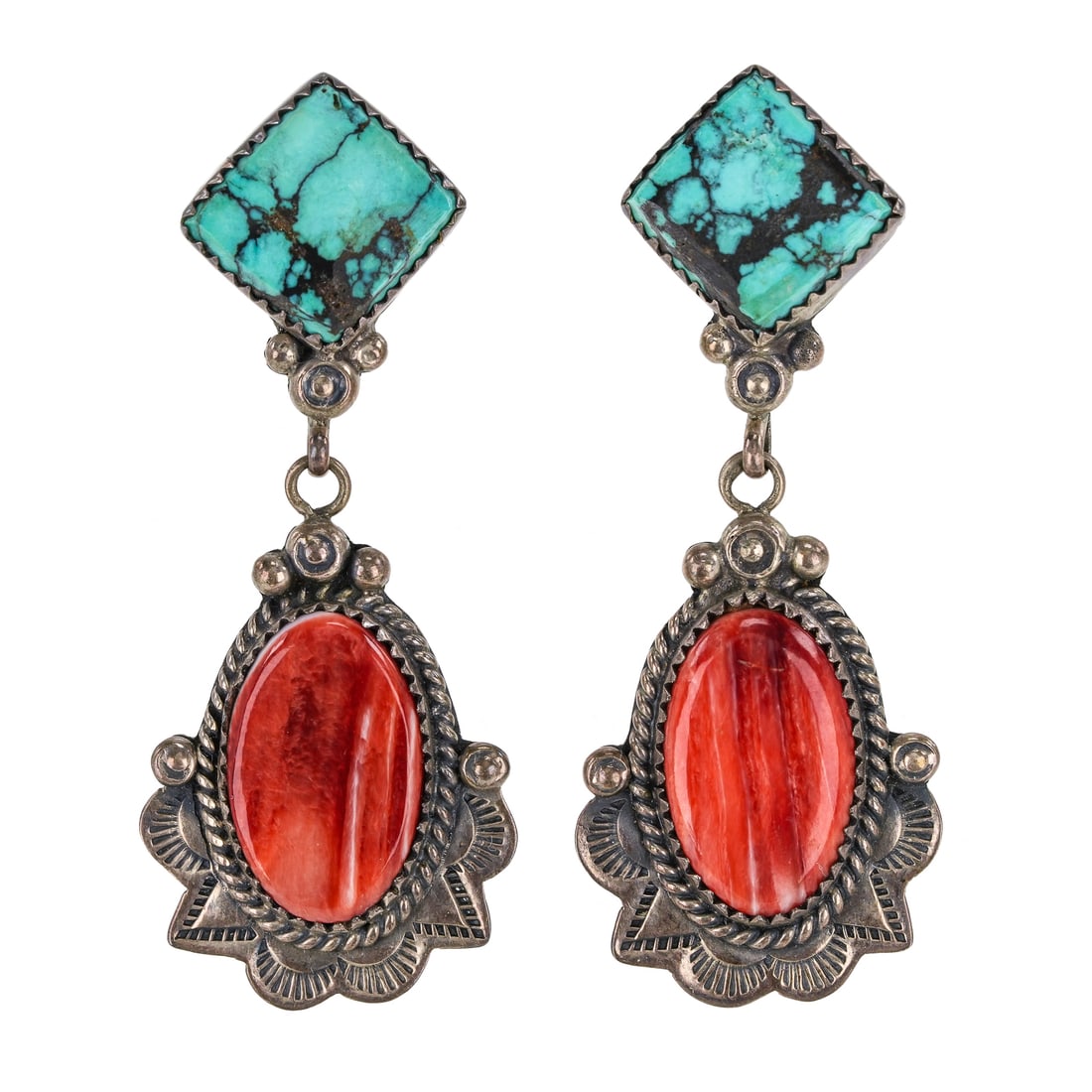 Pair of Oscar Alexis Navajo Earrings: Pair of signed Oscar Alexis Navajo sterling earrings set with square 13 mm blue turquoise tops and a hanging hinged oval 20 mm long red spiny oyster shell. 2 1/8" long each.